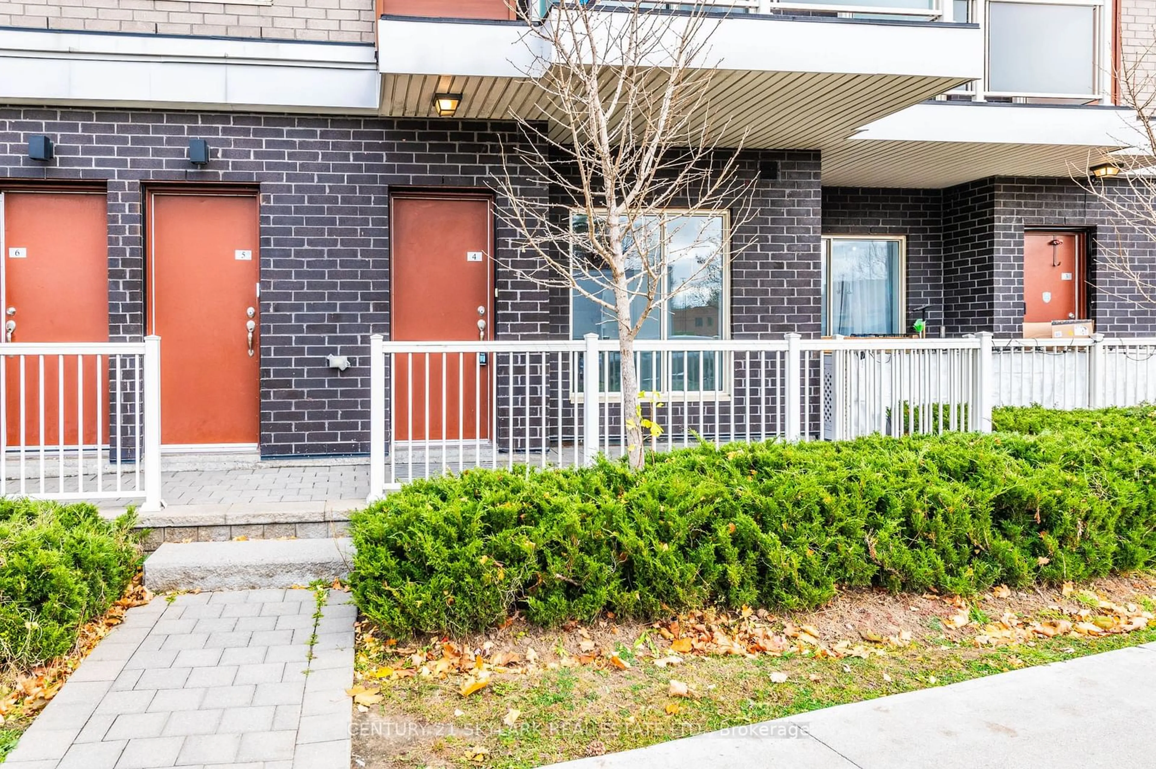 A pic from exterior of the house or condo, the fenced backyard for 1367 Neilson Rd #4, Toronto Ontario M1B 3C2