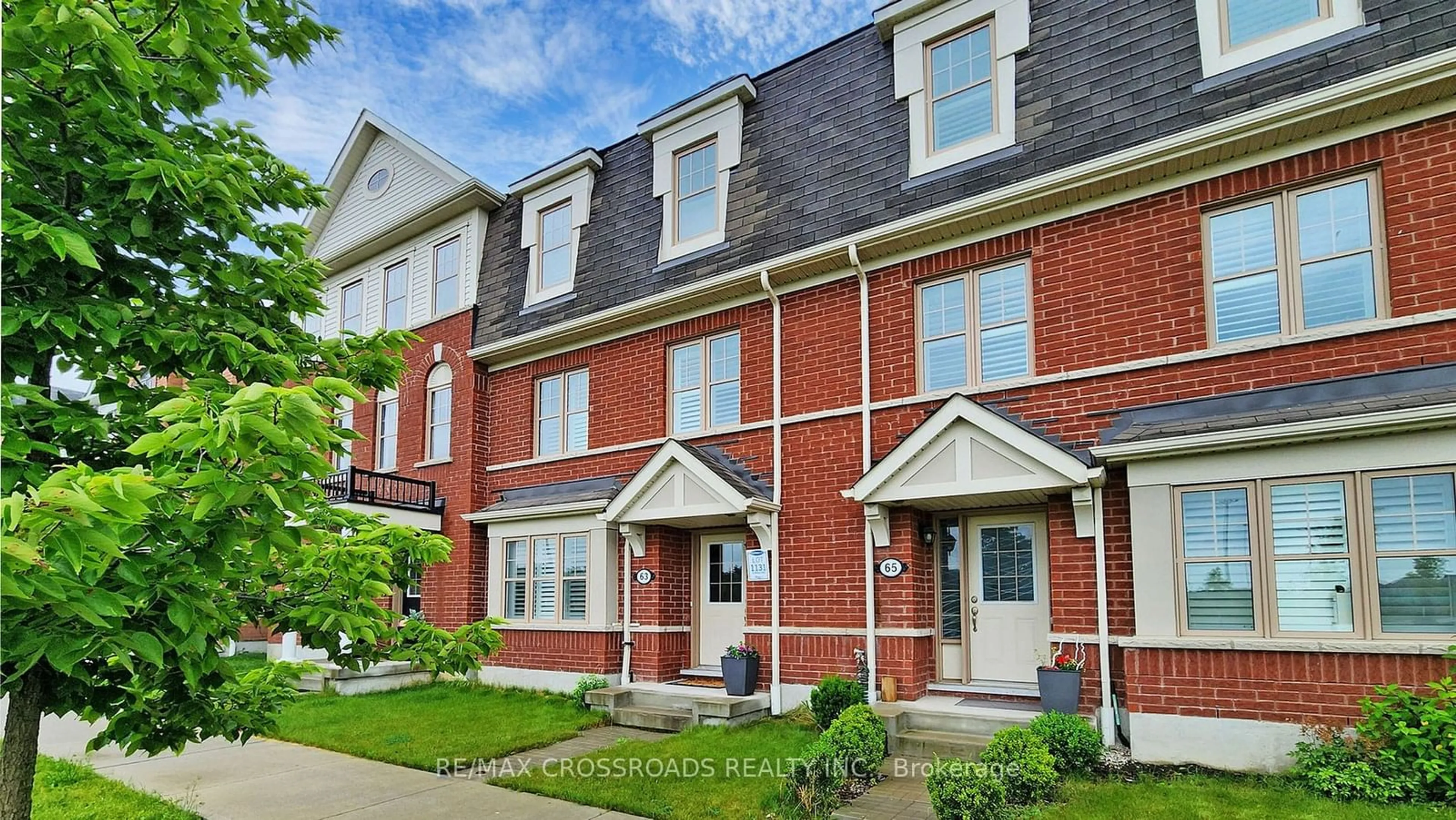 A pic from exterior of the house or condo, the street view for 63 Whitefish St, Whitby Ontario L1P 0E4