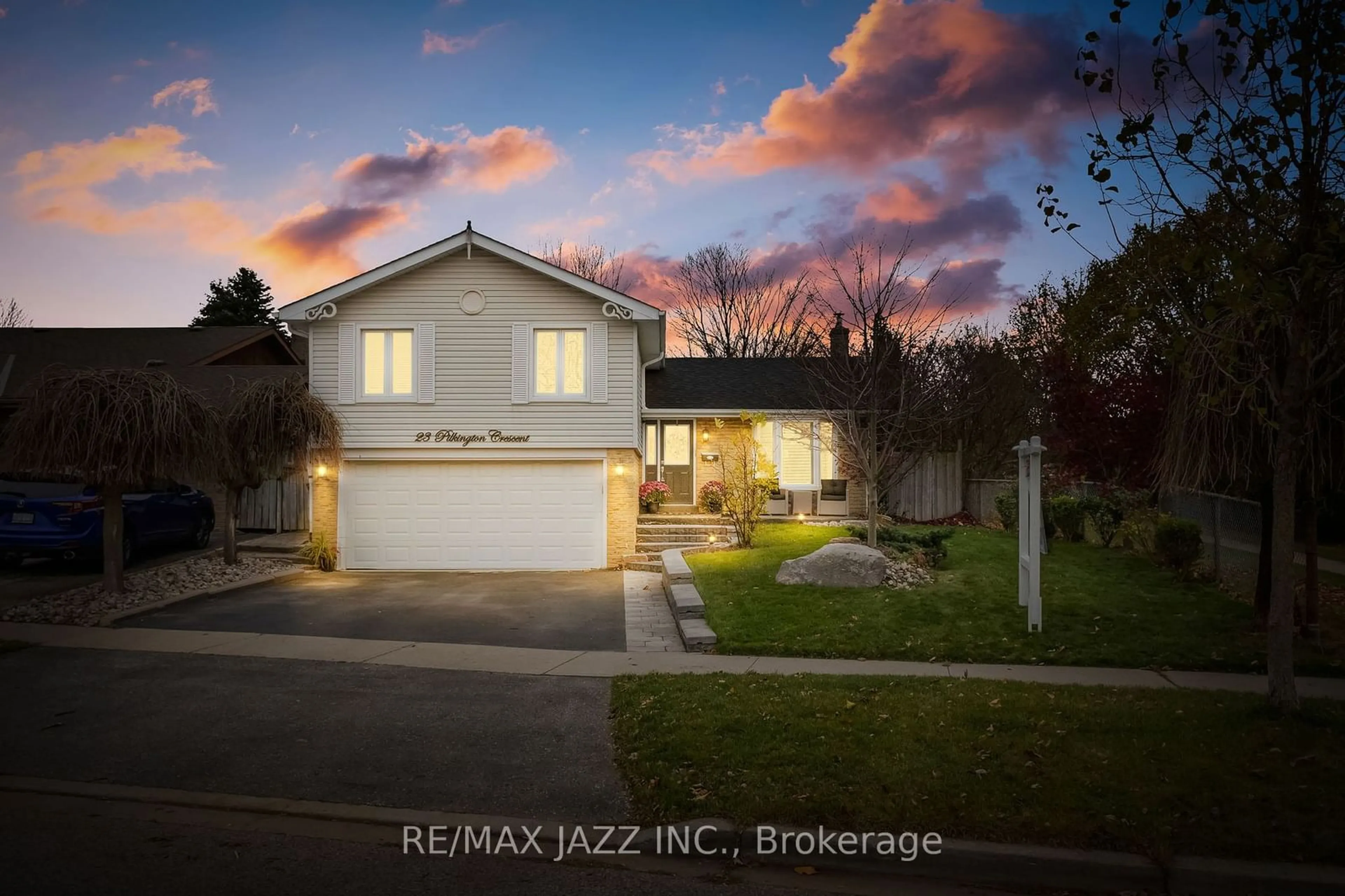 Frontside or backside of a home, the fenced backyard for 23 Pilkington Cres, Whitby Ontario L1N 6E8