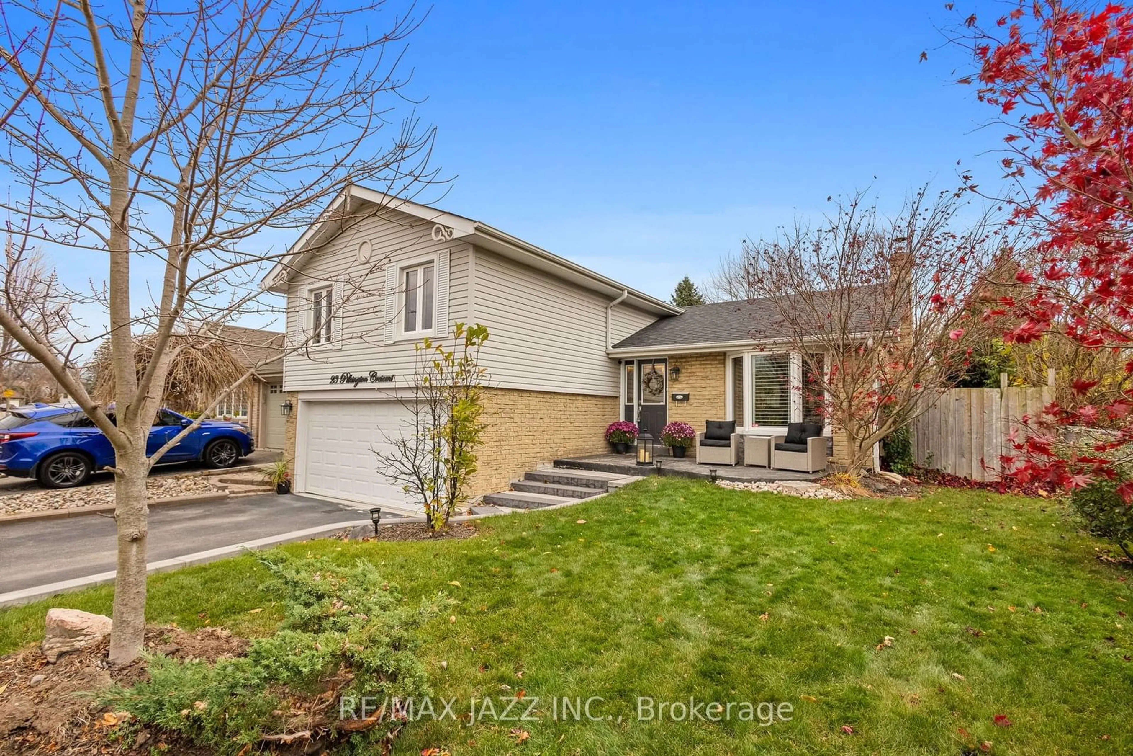 Frontside or backside of a home, the fenced backyard for 23 Pilkington Cres, Whitby Ontario L1N 6E8