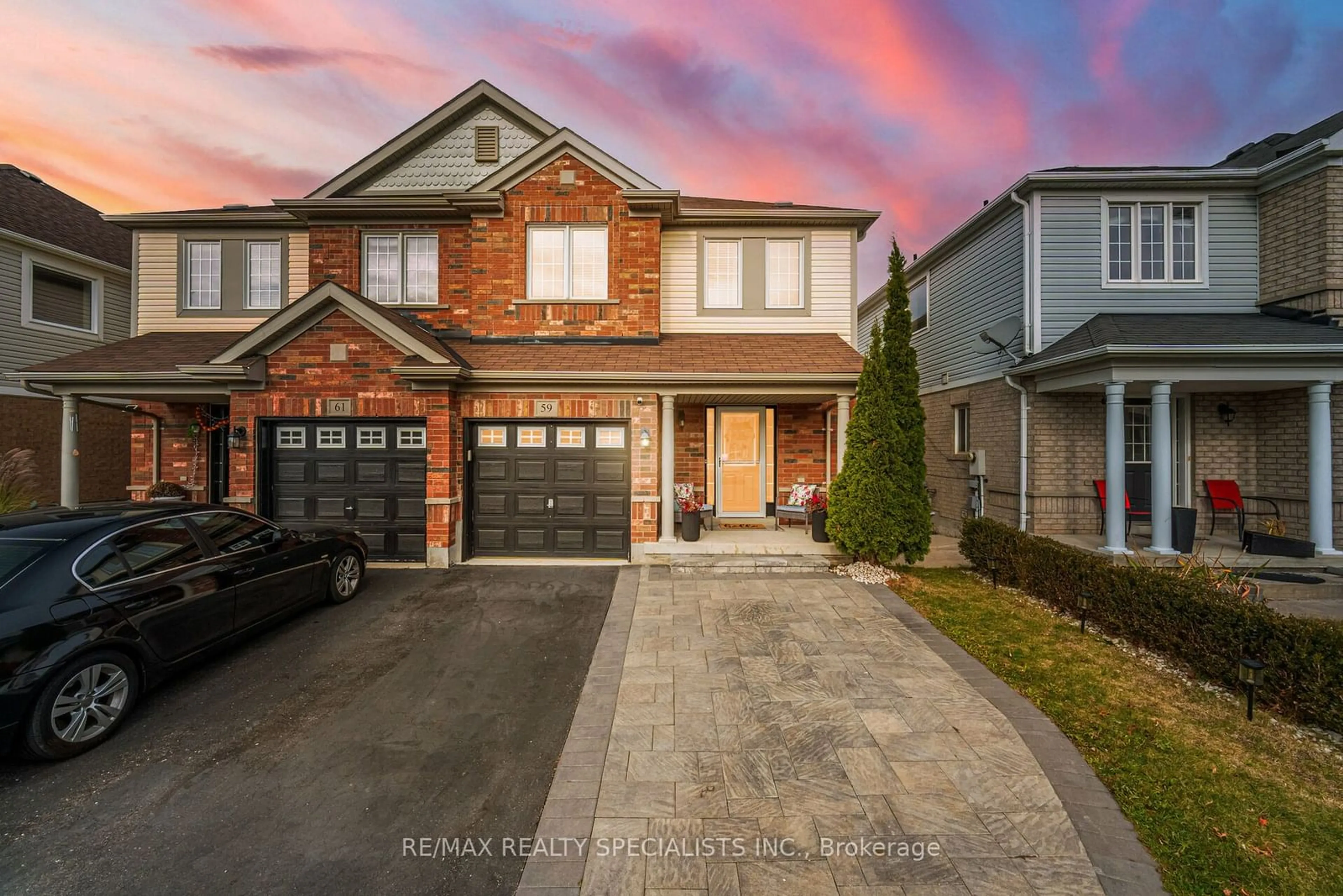 Frontside or backside of a home, the street view for 59 Decourcy-Ireland Circ, Ajax Ontario L1T 0K6