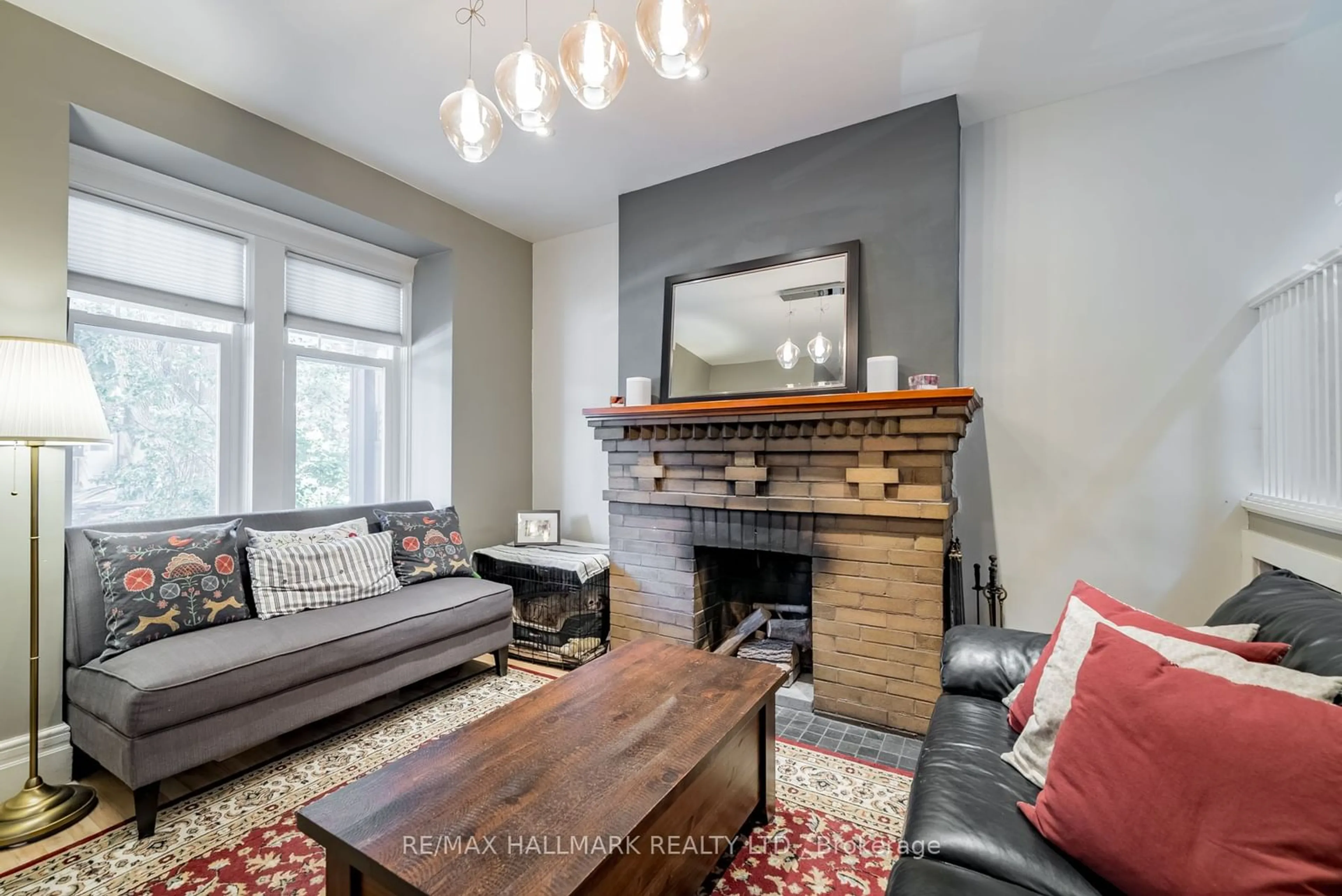 Living room, wood floors for 136 Monarch Park Ave, Toronto Ontario M4J 4R4