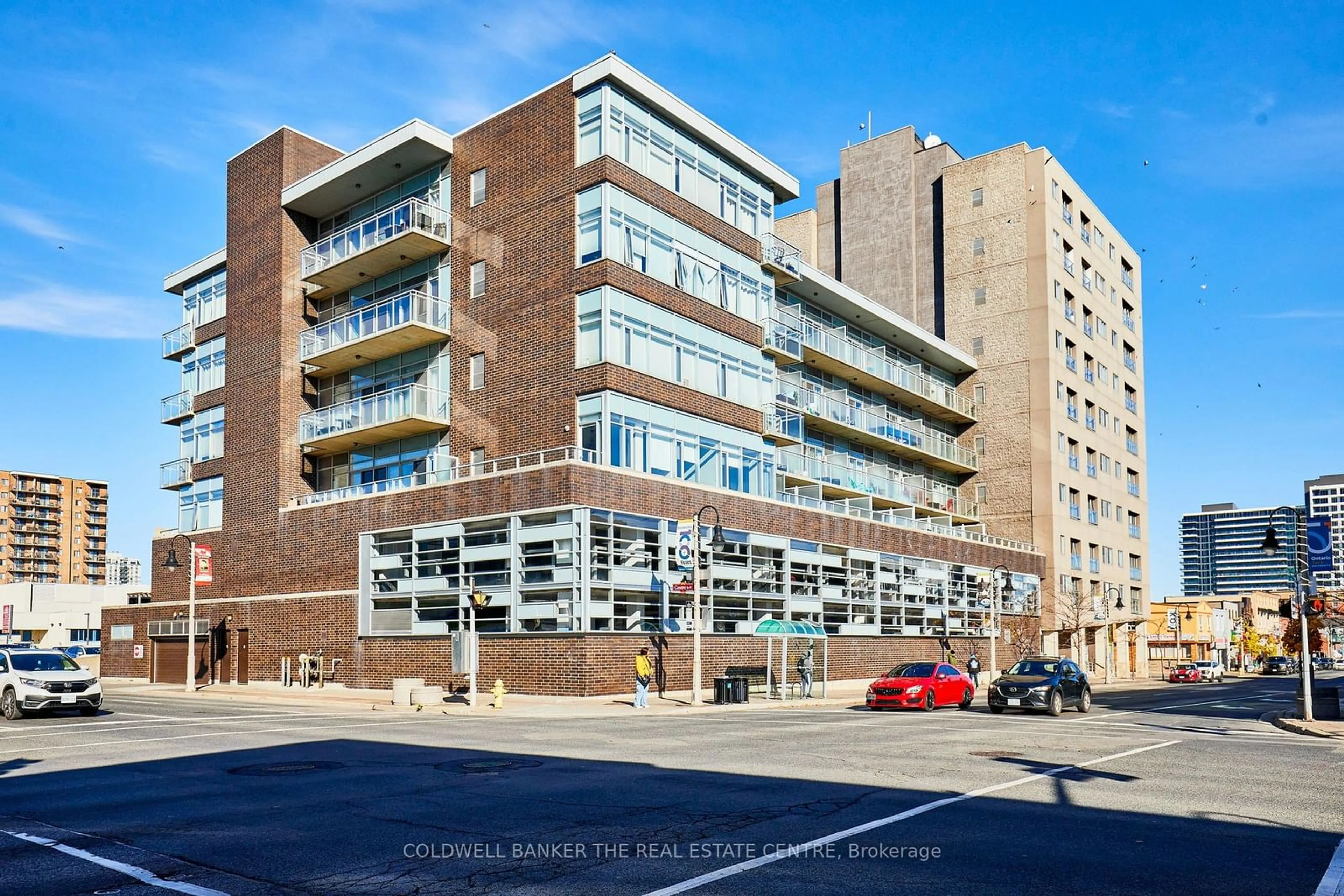 A pic from exterior of the house or condo, the front or back of building for 44 Bond St #318, Oshawa Ontario L1G 6R2