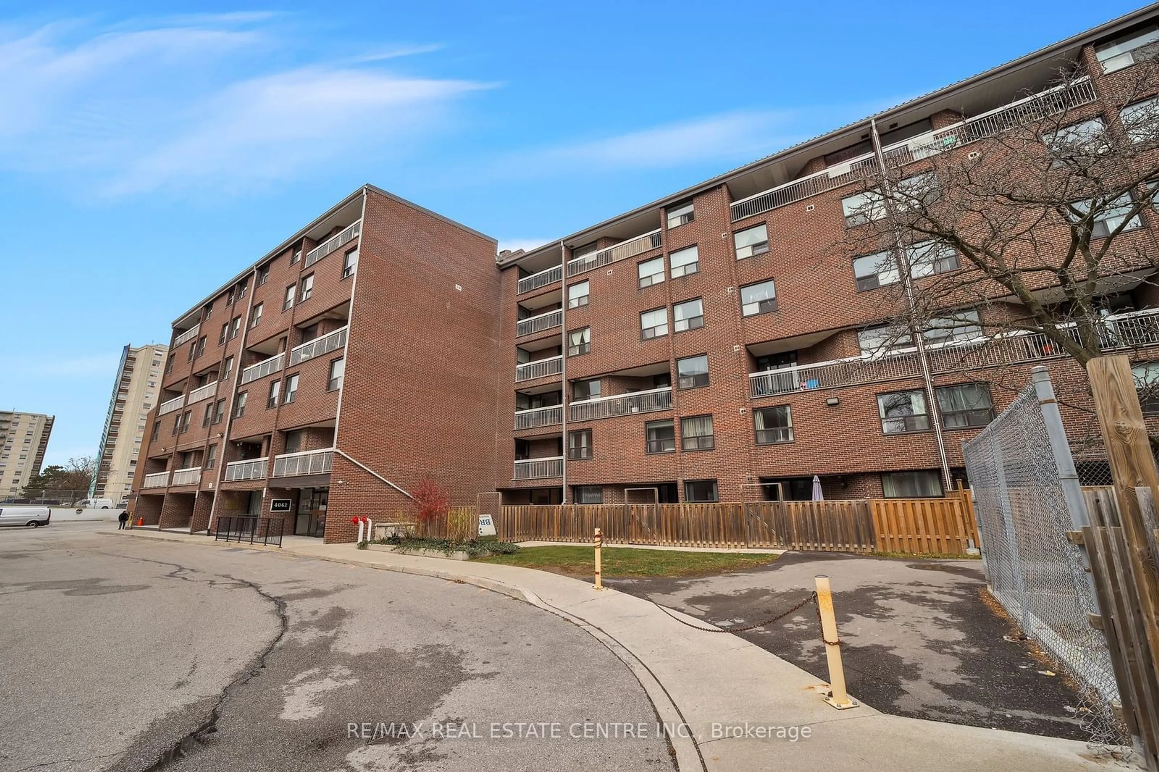 A pic from exterior of the house or condo, the front or back of building for 4062 Lawrence Ave #106, Toronto Ontario M1E 4V5