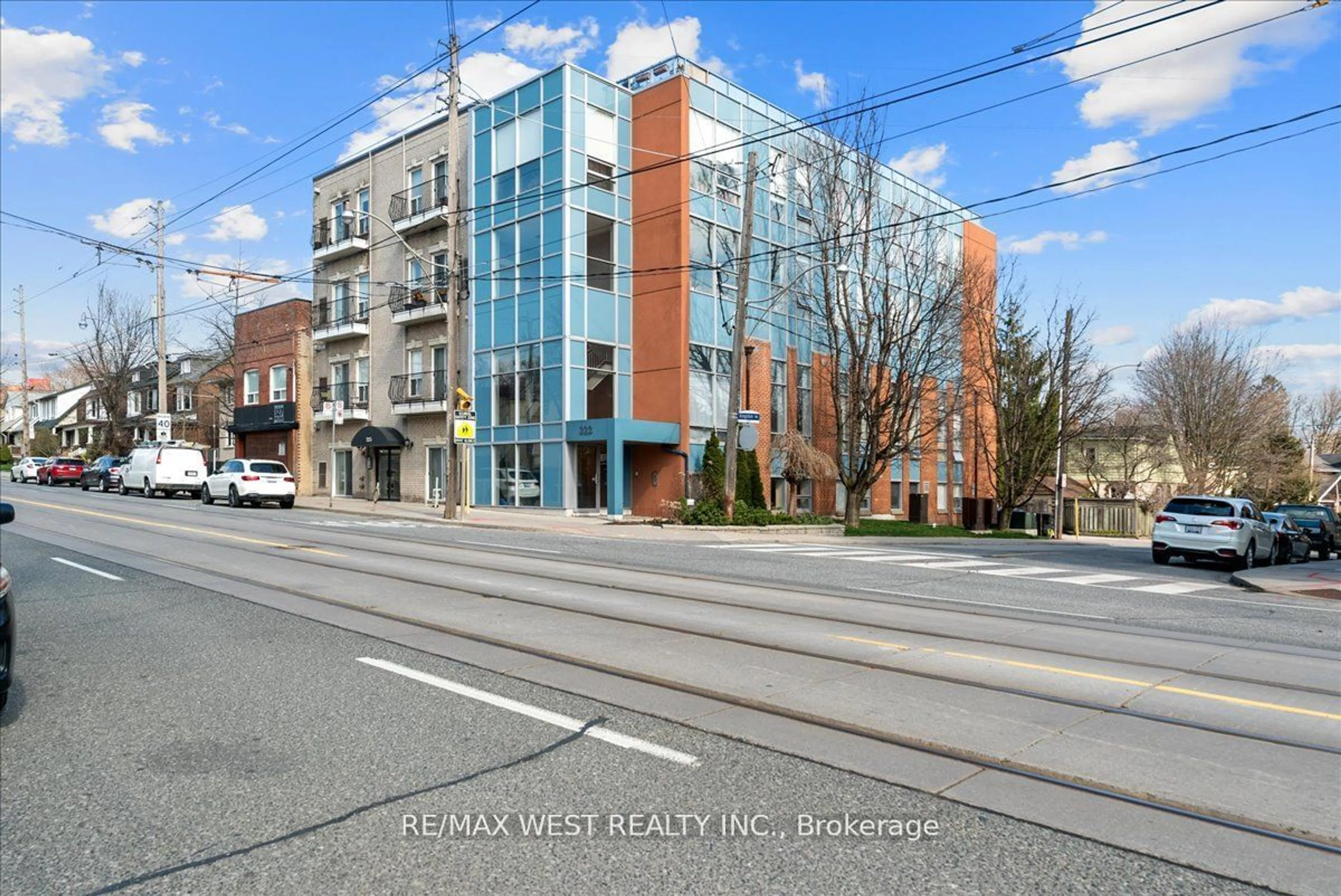 A pic from exterior of the house or condo, the street view for 323 Kingston Rd #101, Toronto Ontario M4L 1T8