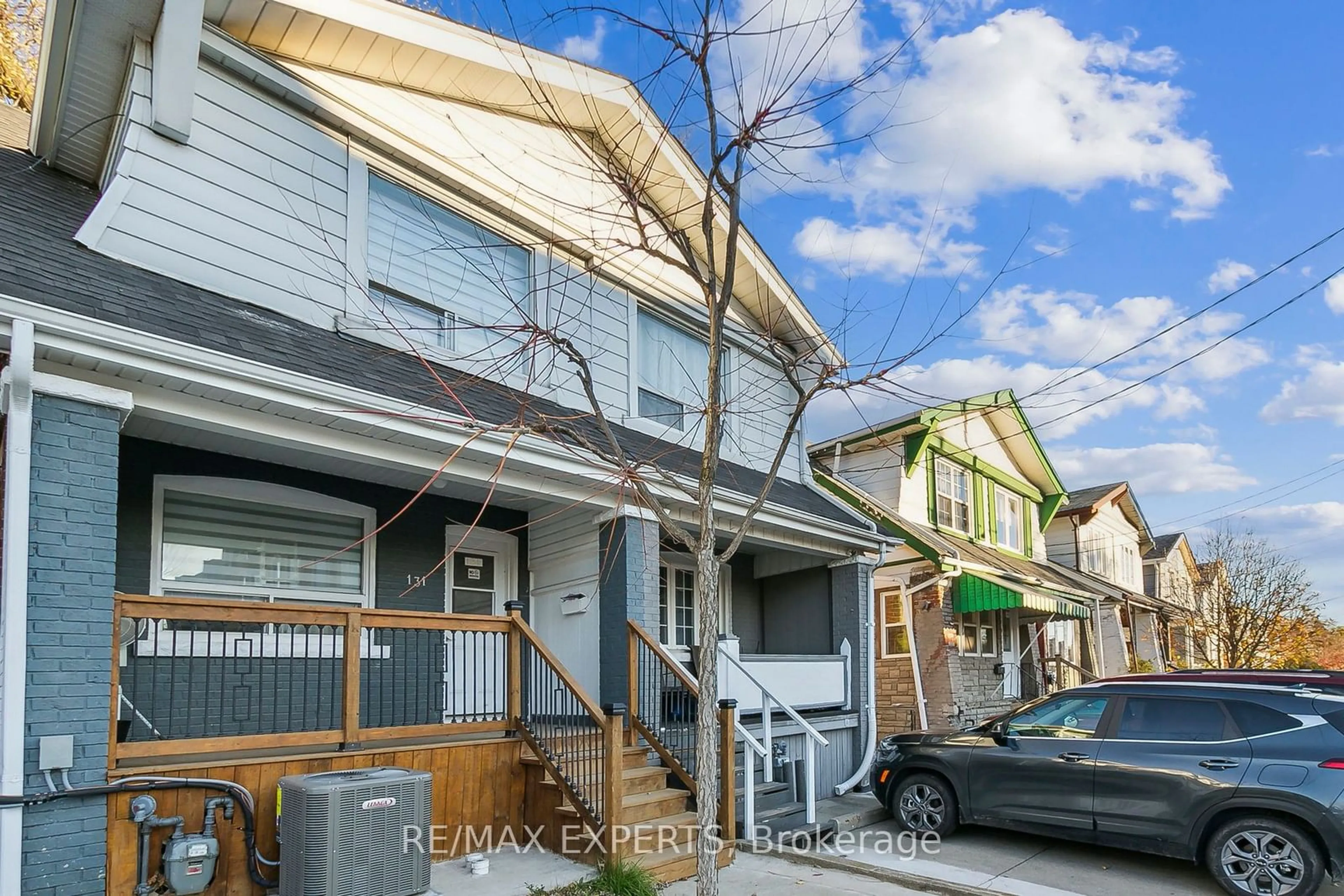 A pic from exterior of the house or condo, the street view for 131 Donlands Ave, Toronto Ontario M4J 3P3