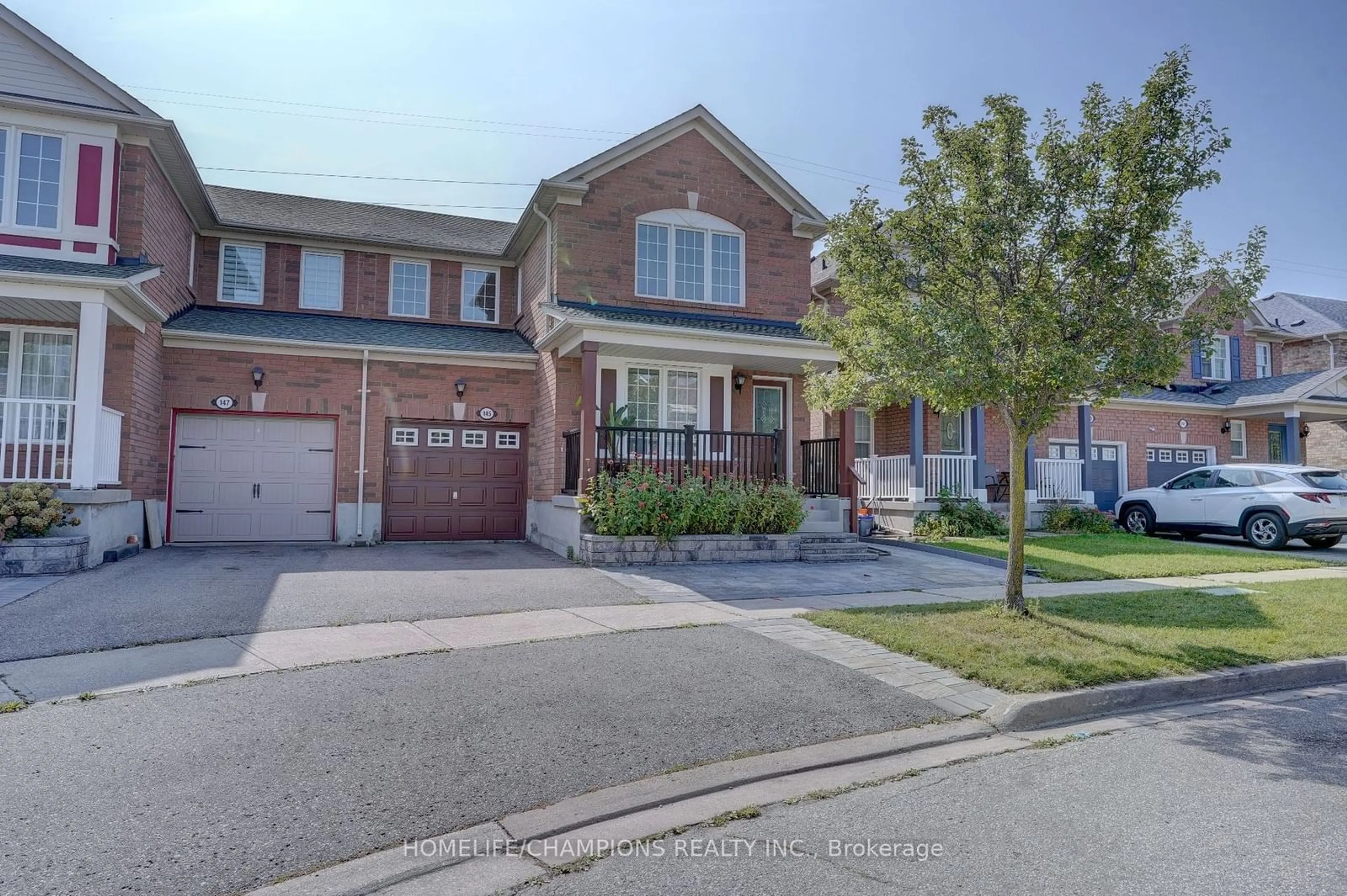 A pic from exterior of the house or condo, the street view for 145 Raponi Circ, Toronto Ontario M1X 2C6