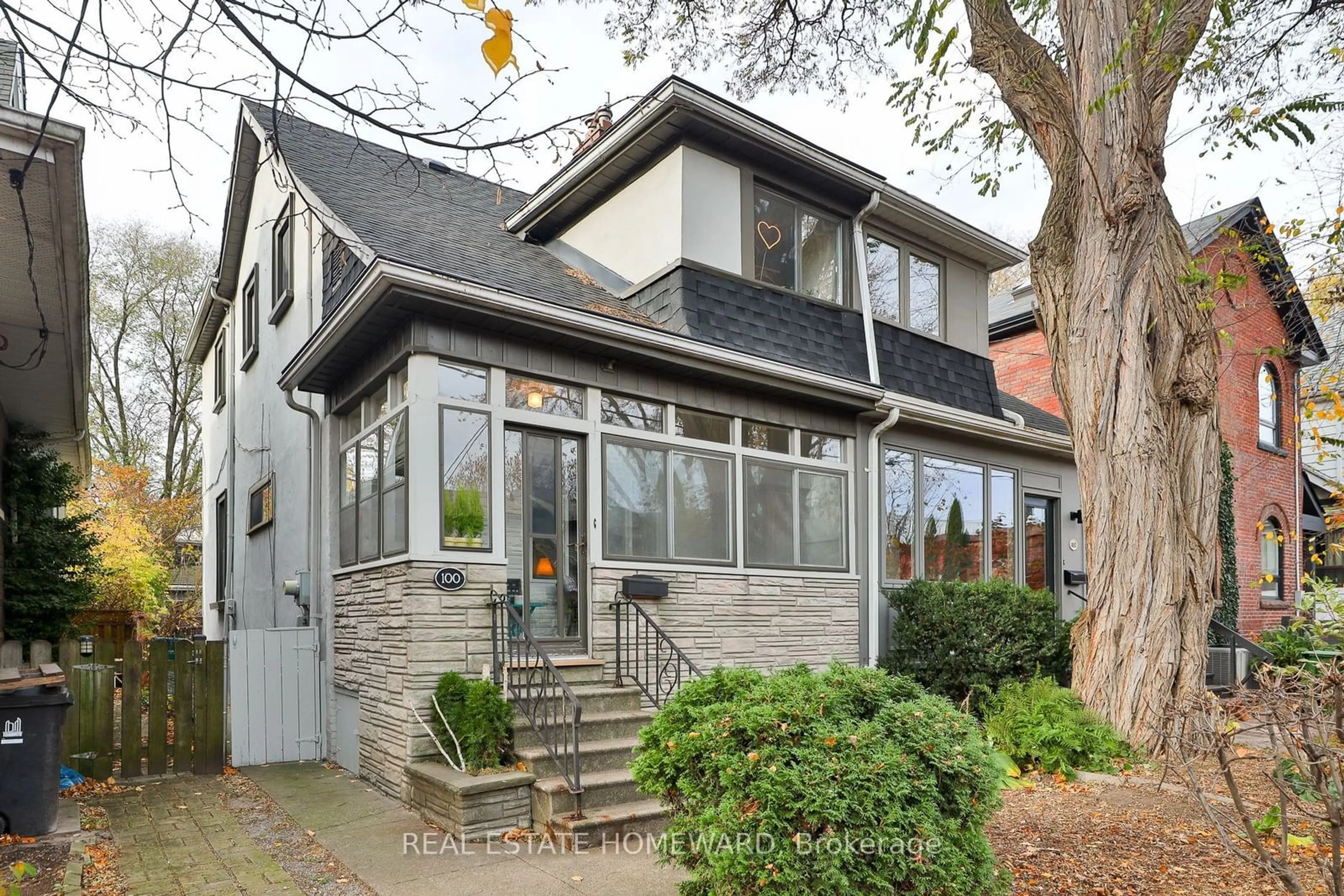 Home with brick exterior material for 100 Caroline Ave, Toronto Ontario M4M 2X7