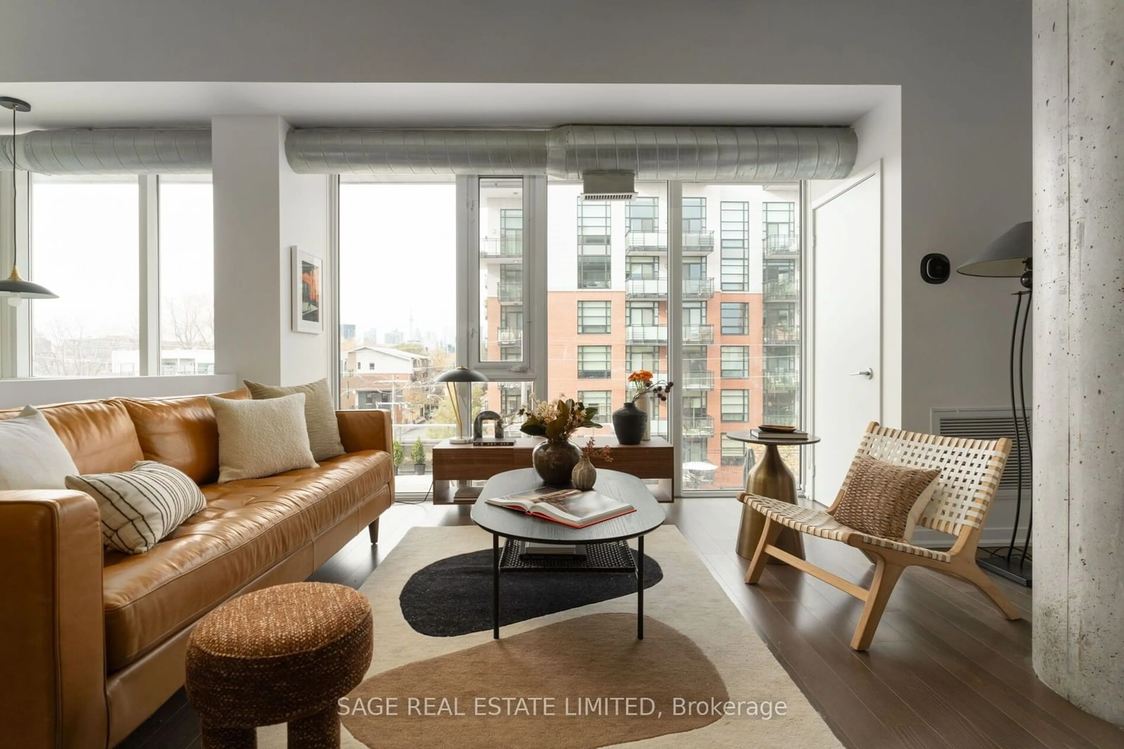 Living room, wood floors for 201 Carlaw Ave #413, Toronto Ontario M4M 2S3