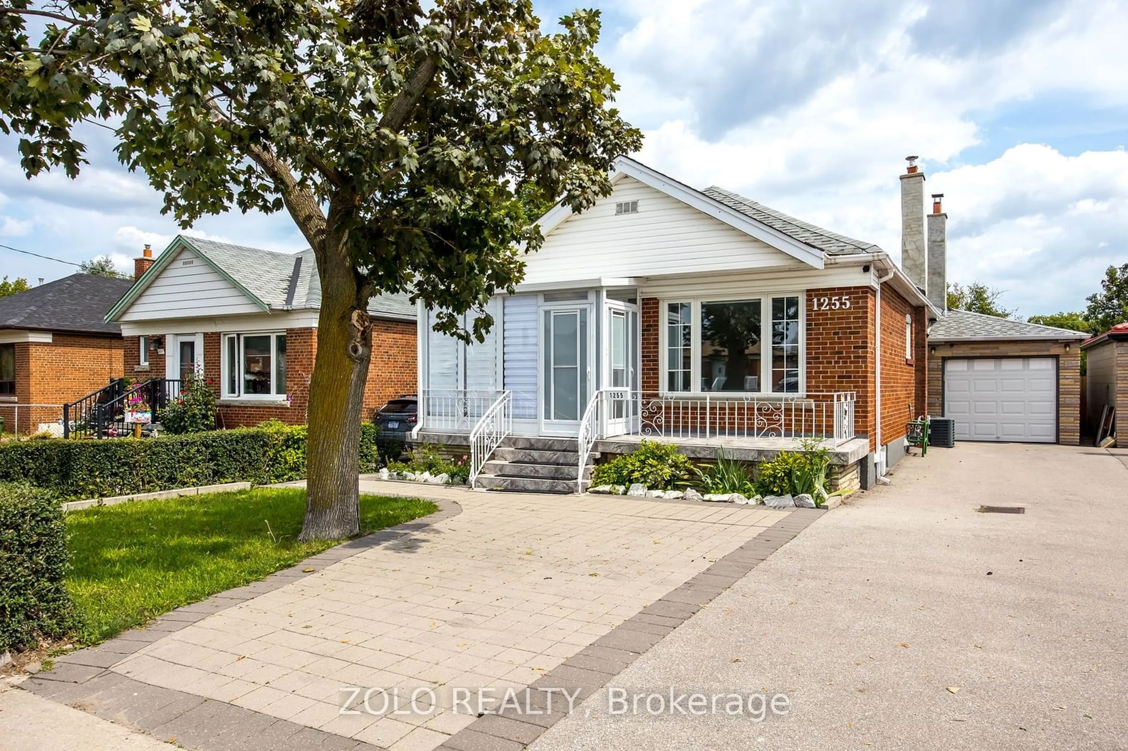 Frontside or backside of a home, the street view for 1255 Warden Ave, Toronto Ontario M1R 2R4