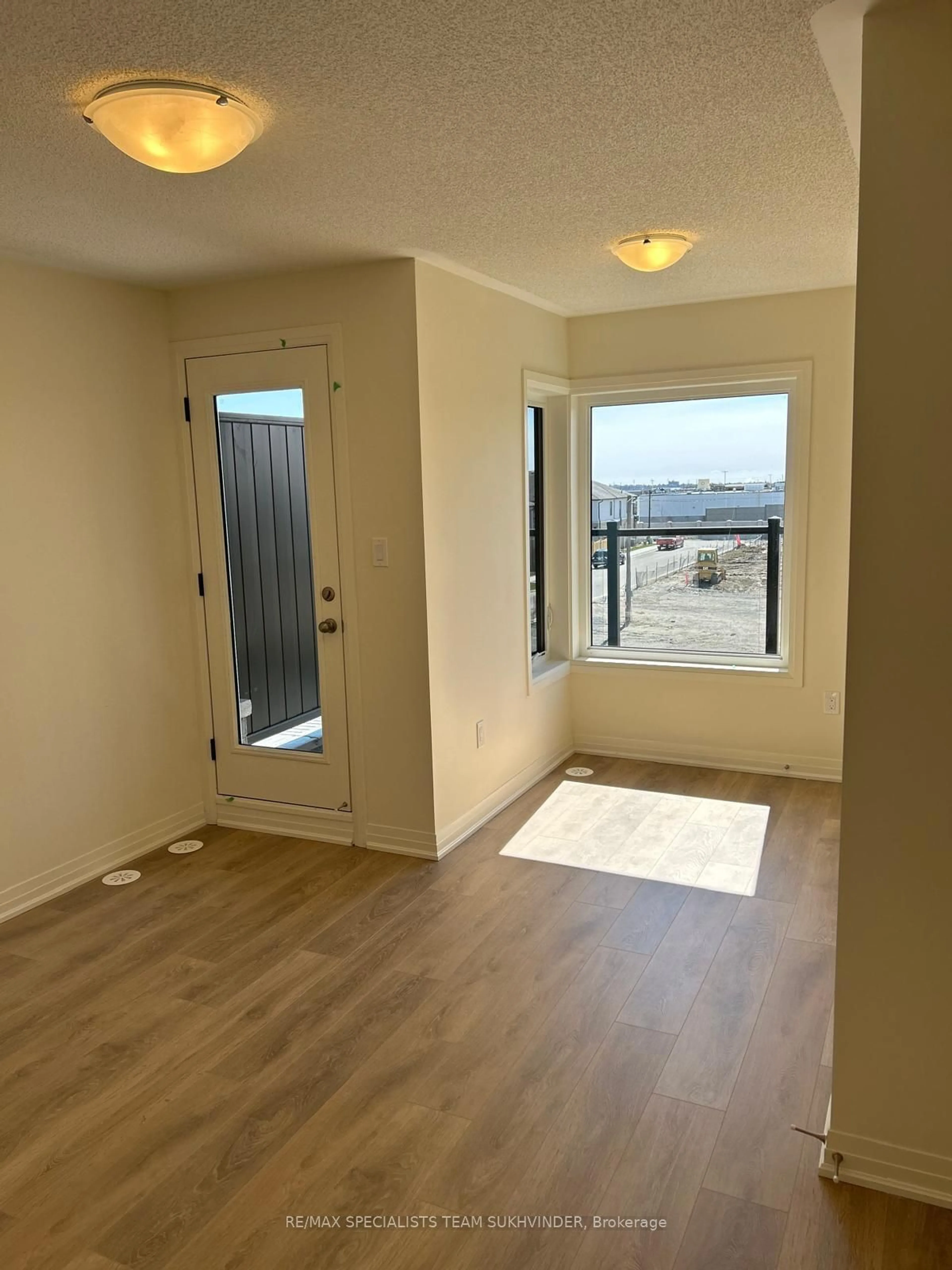 A pic of a room, wood floors for 30 Esquire Way, Whitby Ontario L1R 3K4