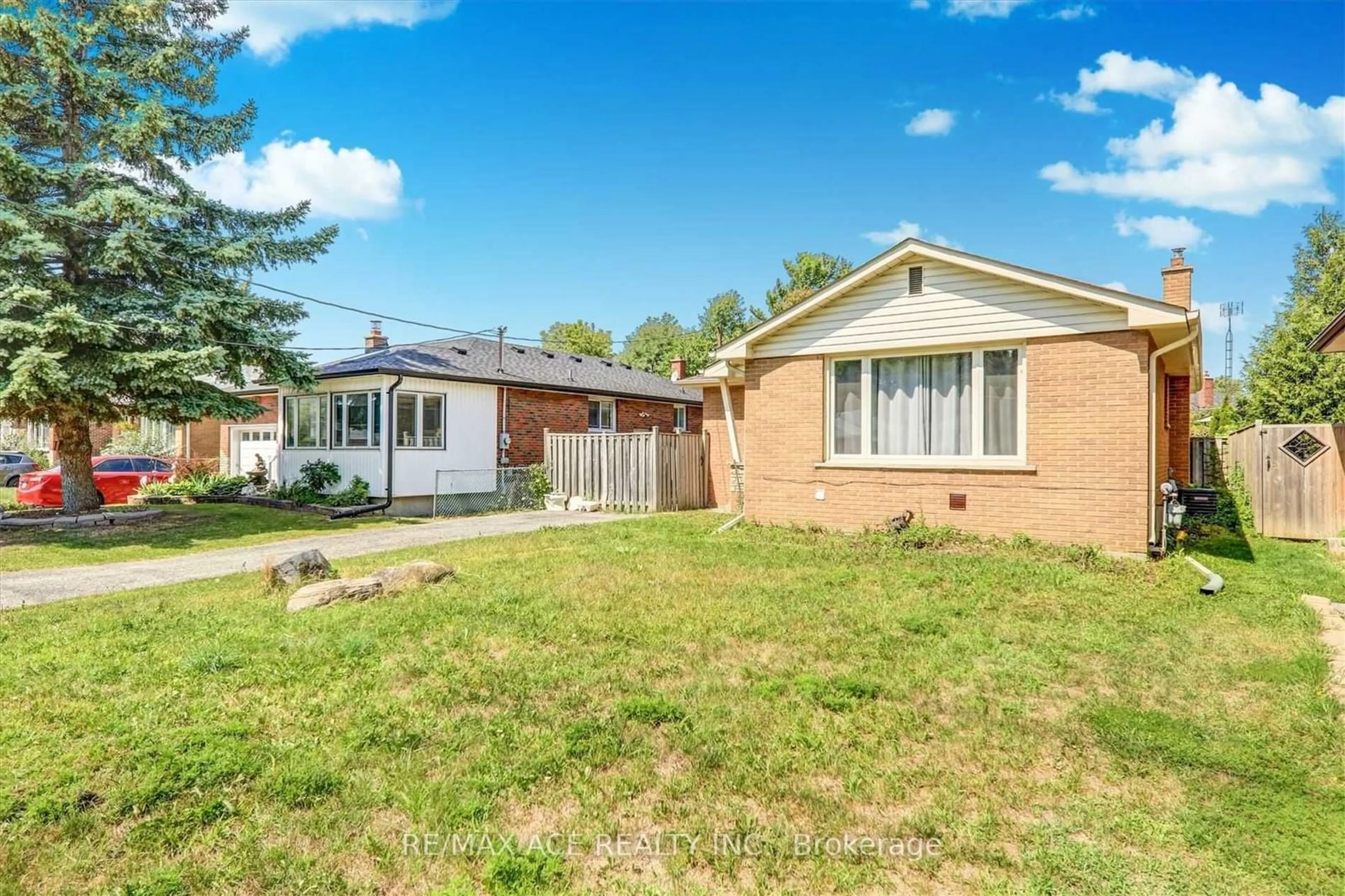 Frontside or backside of a home, the fenced backyard for 646 Gibb St, Oshawa Ontario L1J 1Z7