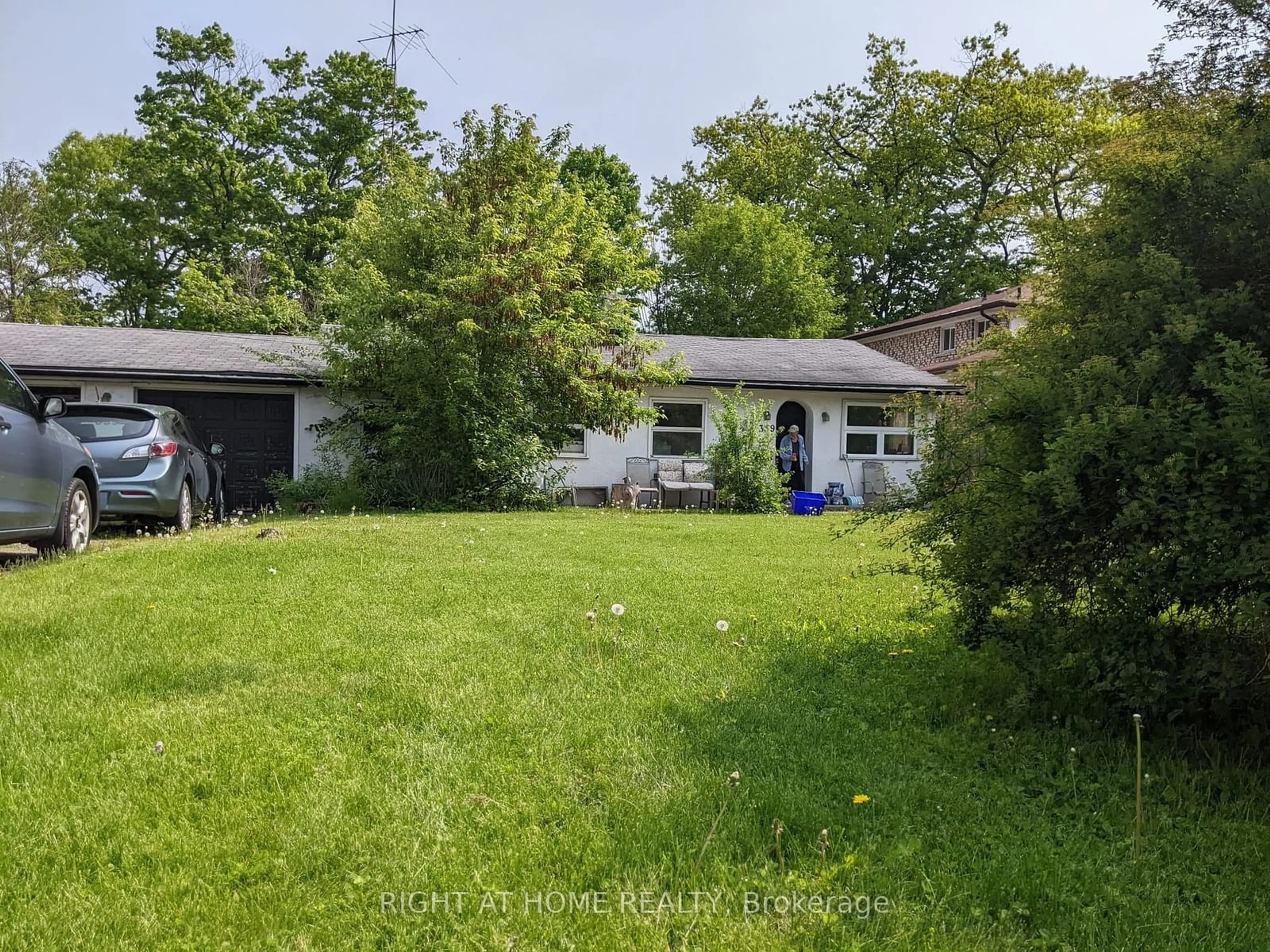 Frontside or backside of a home, the fenced backyard for 339 Rouge Hills Dr, Toronto Ontario M1C 2Z4