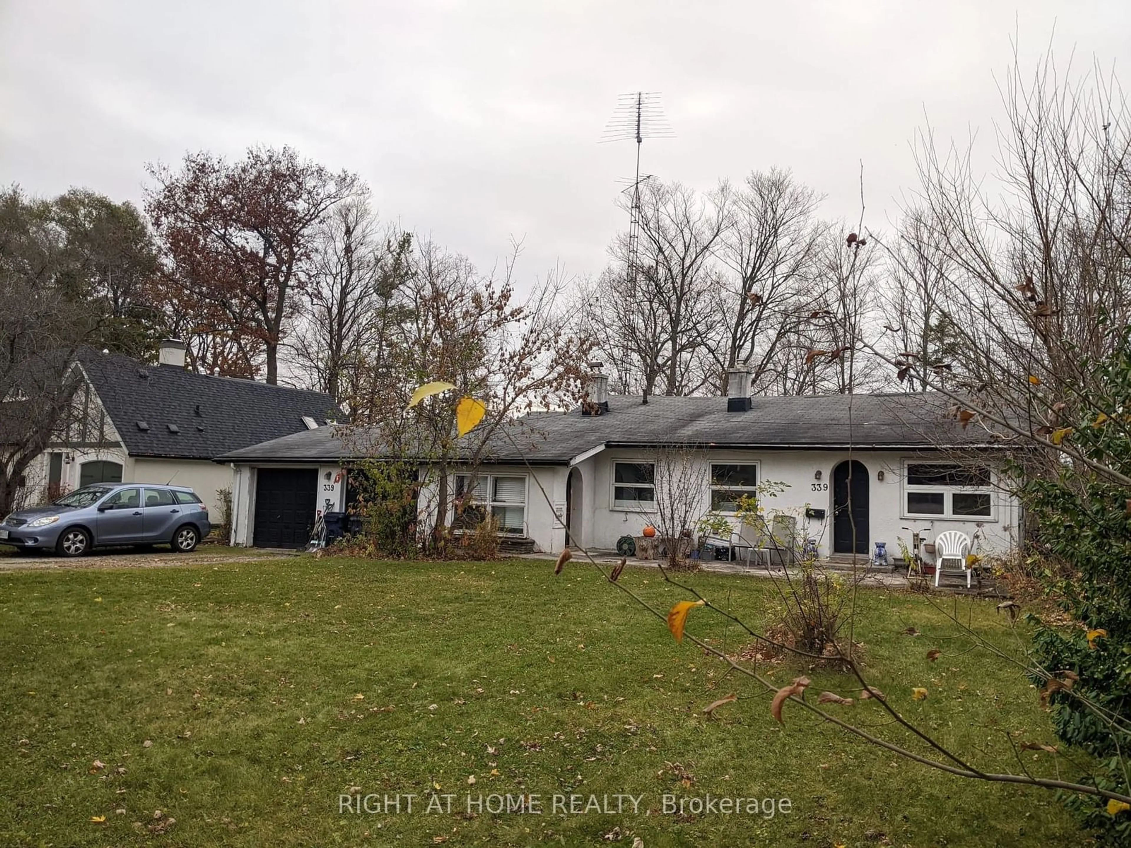 Frontside or backside of a home, the street view for 339 Rouge Hills Dr, Toronto Ontario M1C 2Z4