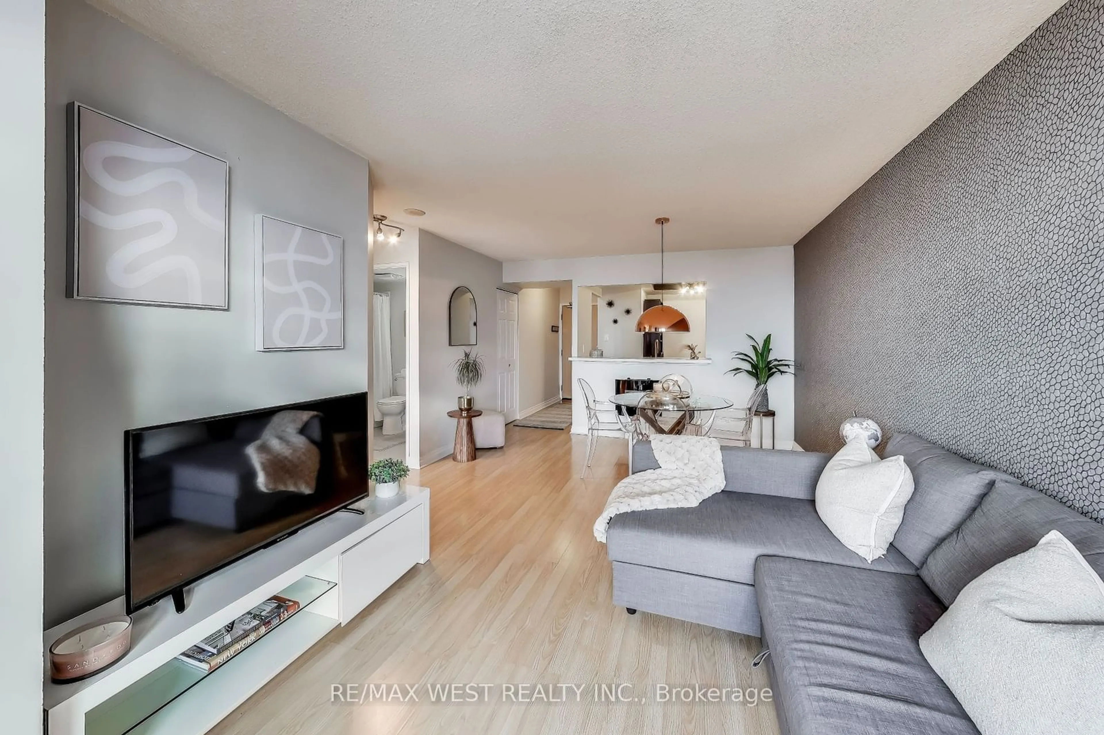 Living room, wood floors for 5 Greystone Walk Dr #1917, Toronto Ontario M1K 5J5