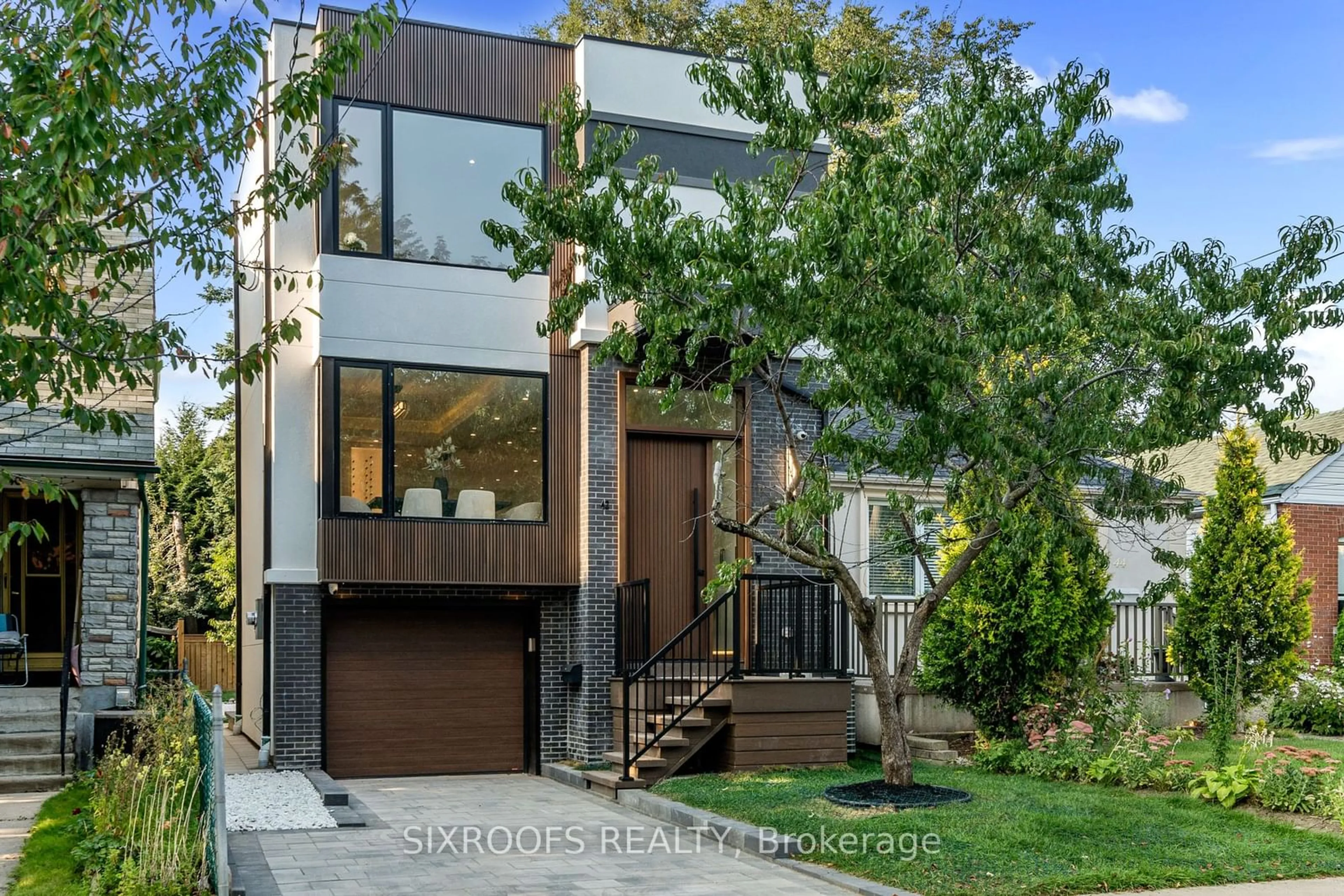 Frontside or backside of a home, the street view for 42 Orley Ave, Toronto Ontario M4C 2C1