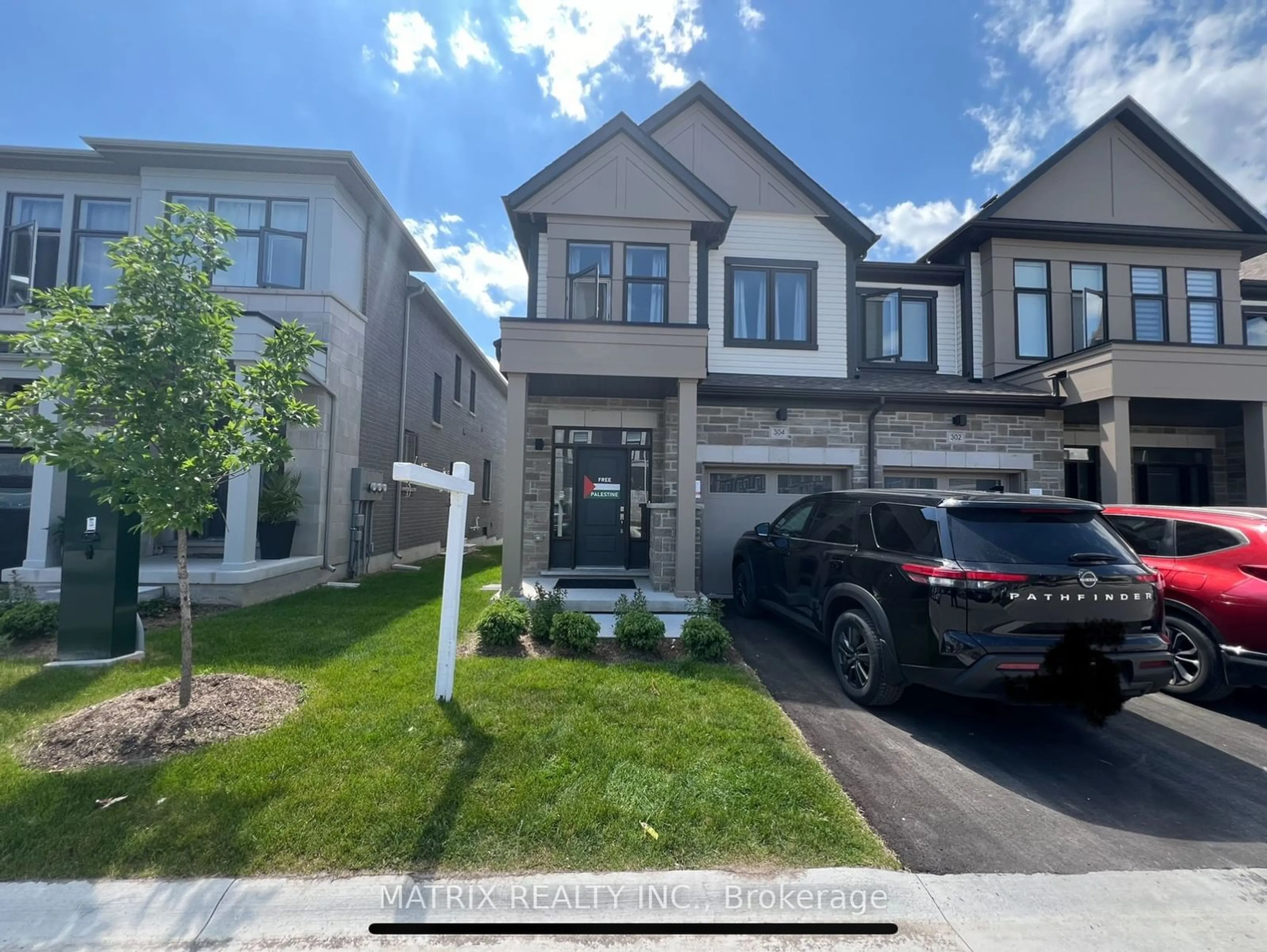 A pic from exterior of the house or condo, the street view for 304 Okanagan Path, Oshawa Ontario L1H 6T6