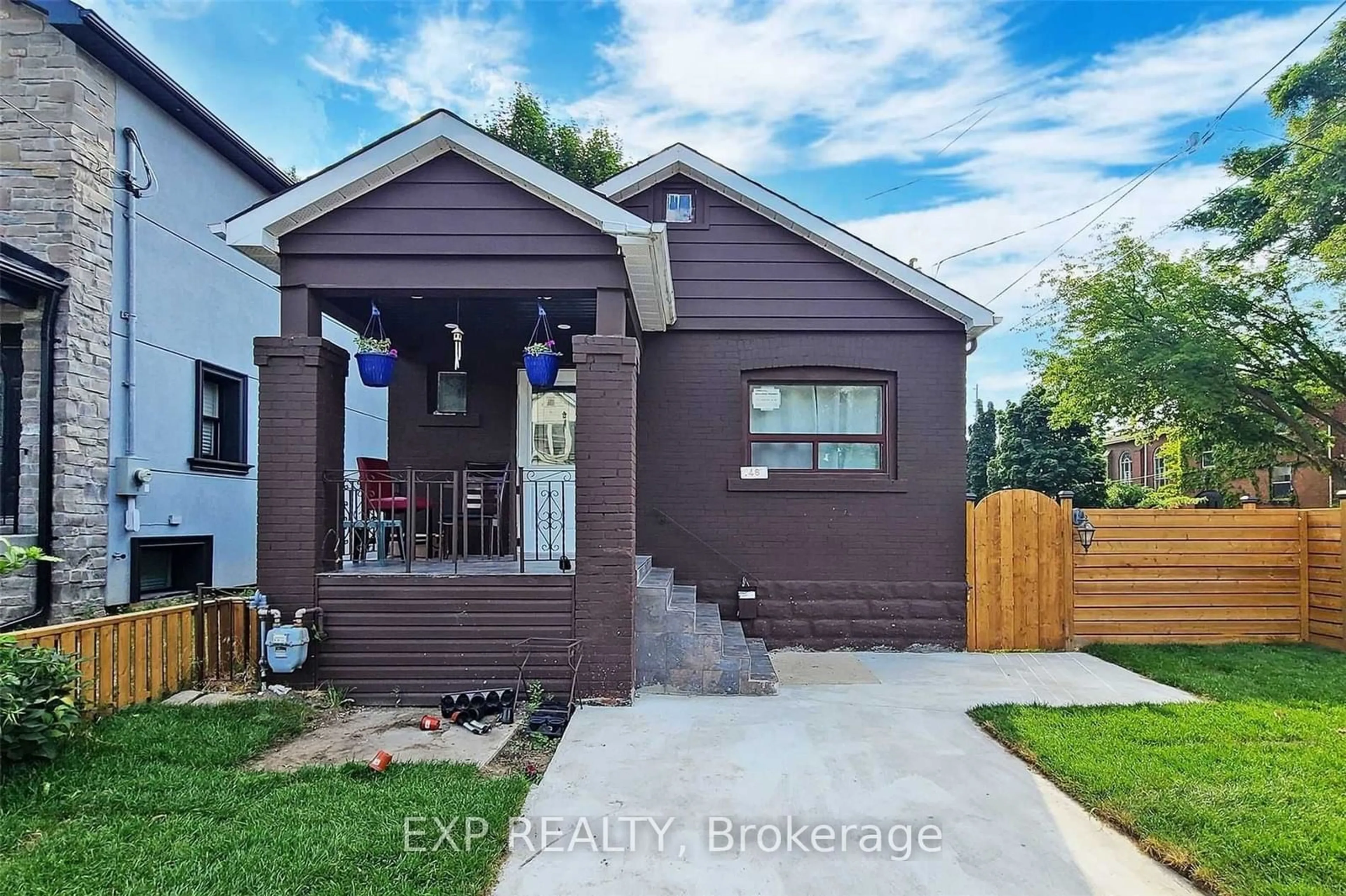 Frontside or backside of a home, the fenced backyard for 146 Coleridge Ave, Toronto Ontario M4C 4H6