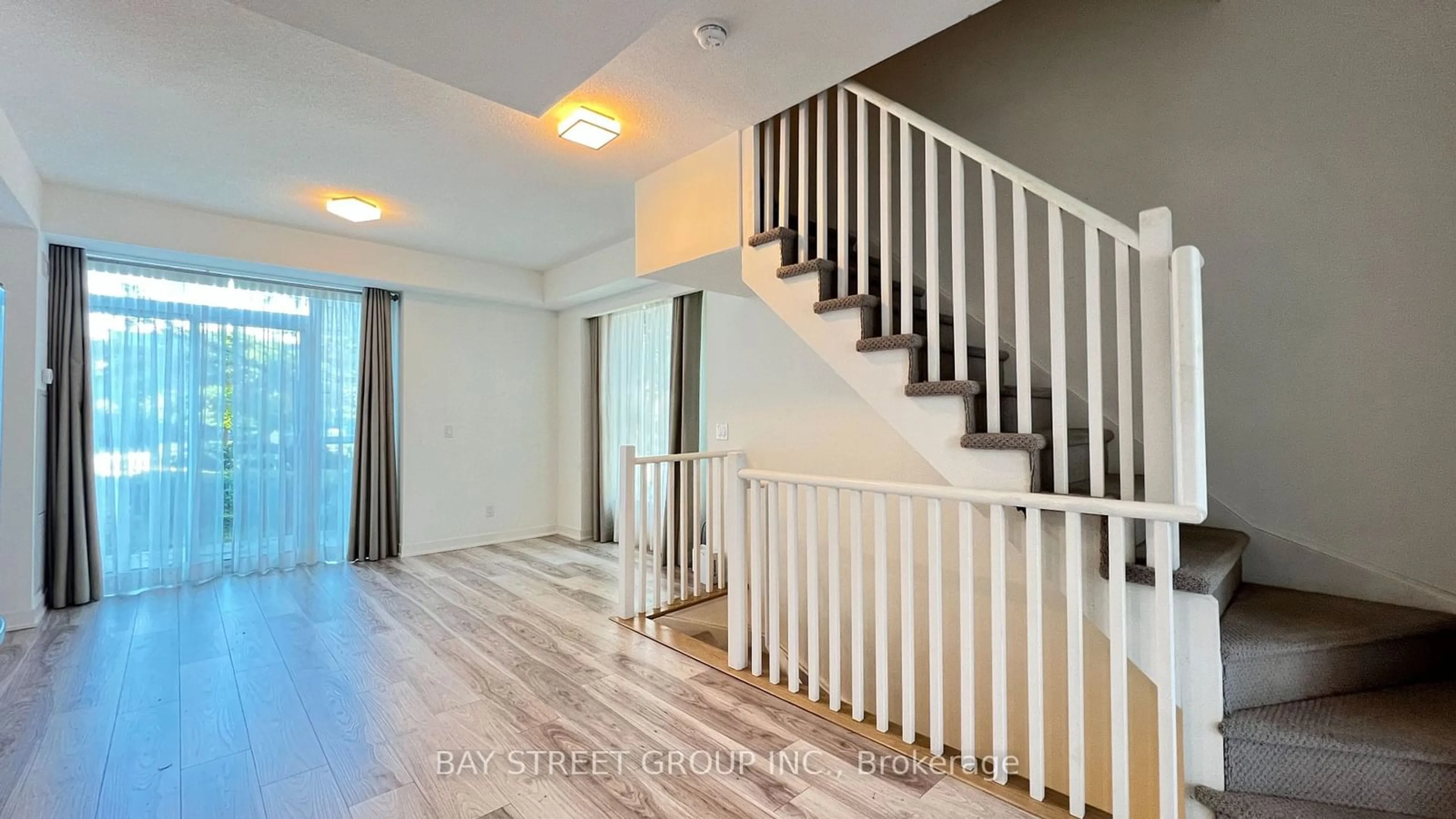 Indoor foyer, wood floors for 205 Bonis Ave #Th1, Toronto Ontario M1T 3W6