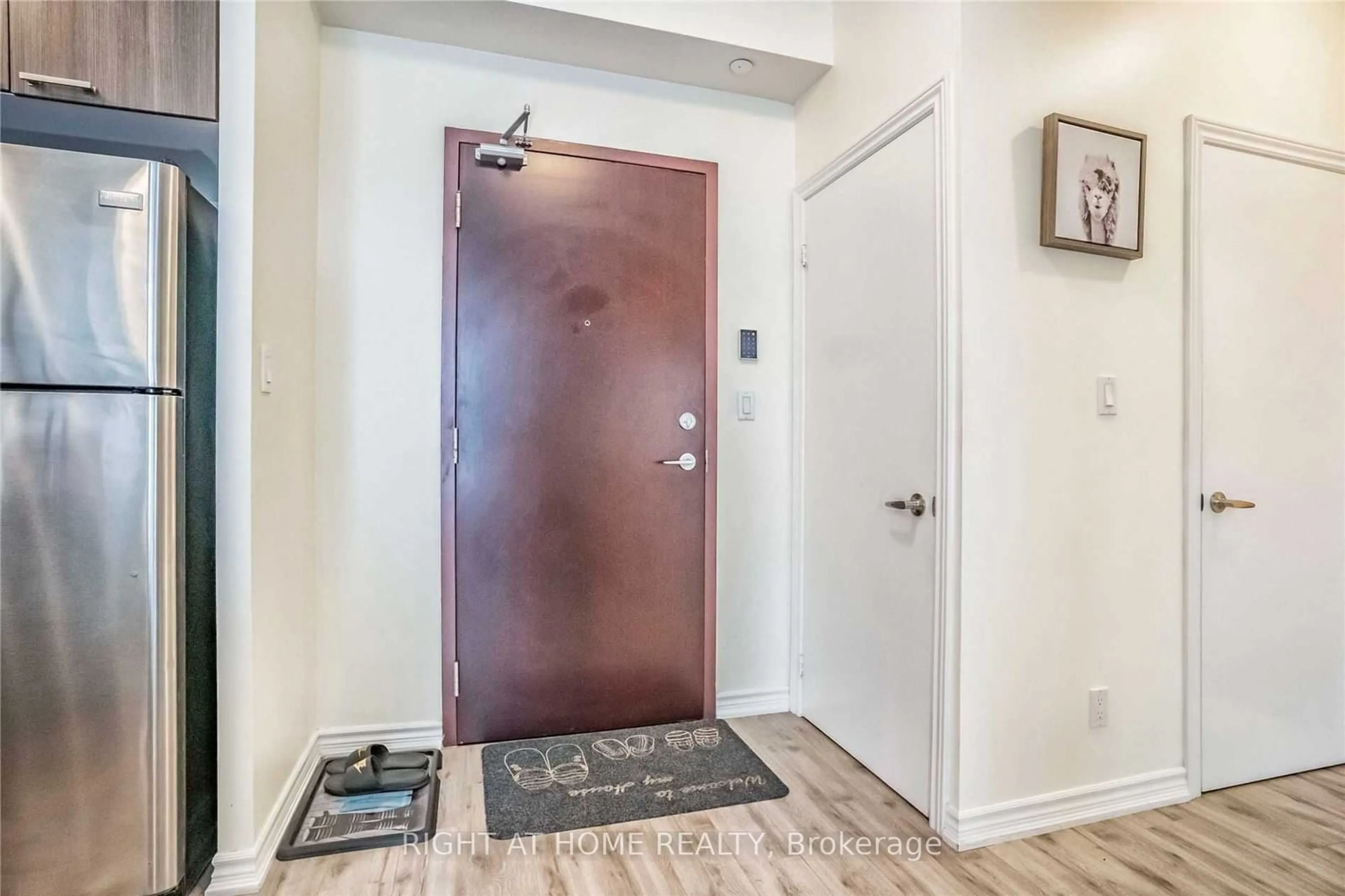 Indoor entryway, wood floors for 1328 Birchmount Rd #205, Toronto Ontario M1R 0B6