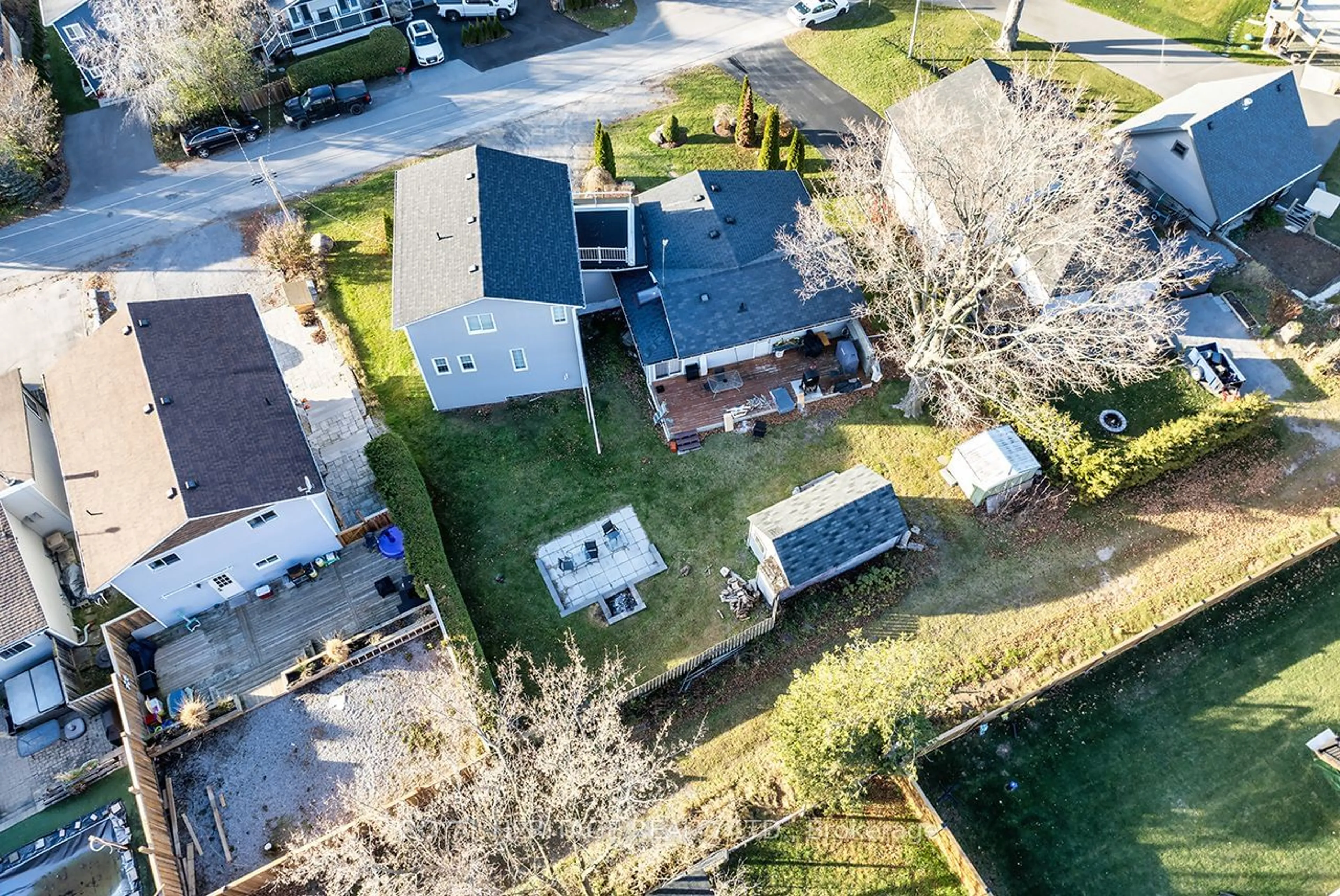 Frontside or backside of a home, the fenced backyard for 64 Cedar Grove Dr, Scugog Ontario L0B 1E0