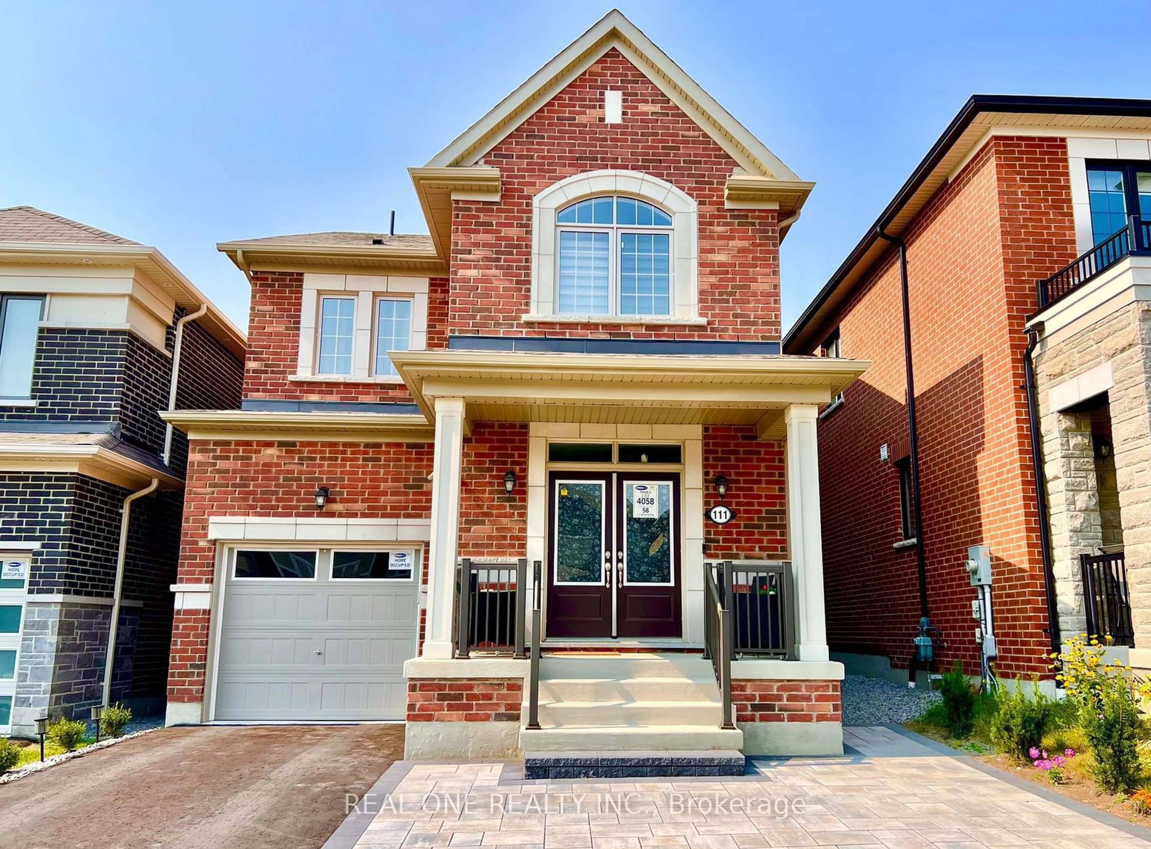 Home with brick exterior material for 111 Barkerville Dr, Whitby Ontario L1P 0L8