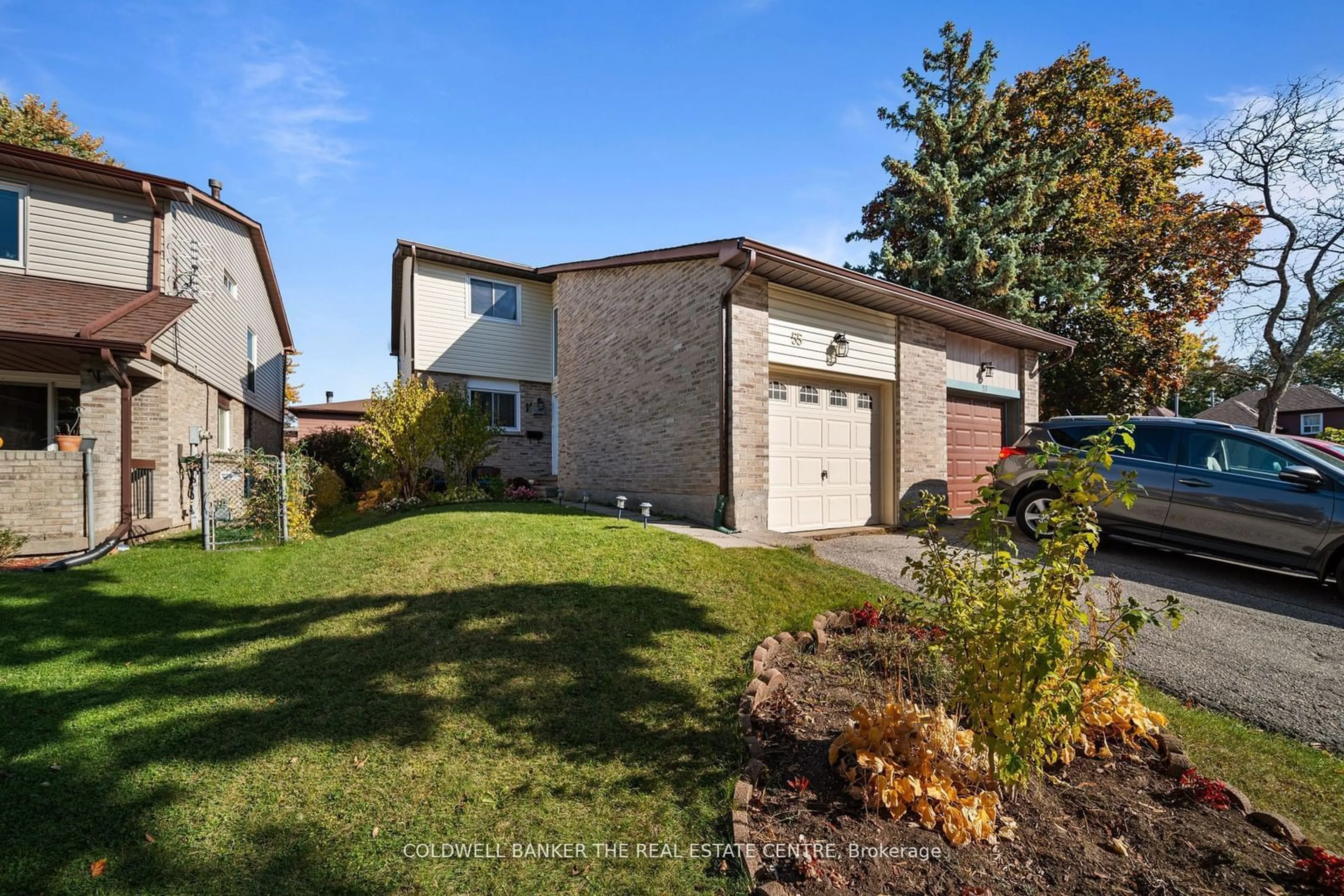 Frontside or backside of a home, the fenced backyard for 55 Deanscroft Sq, Toronto Ontario M1E 4W8