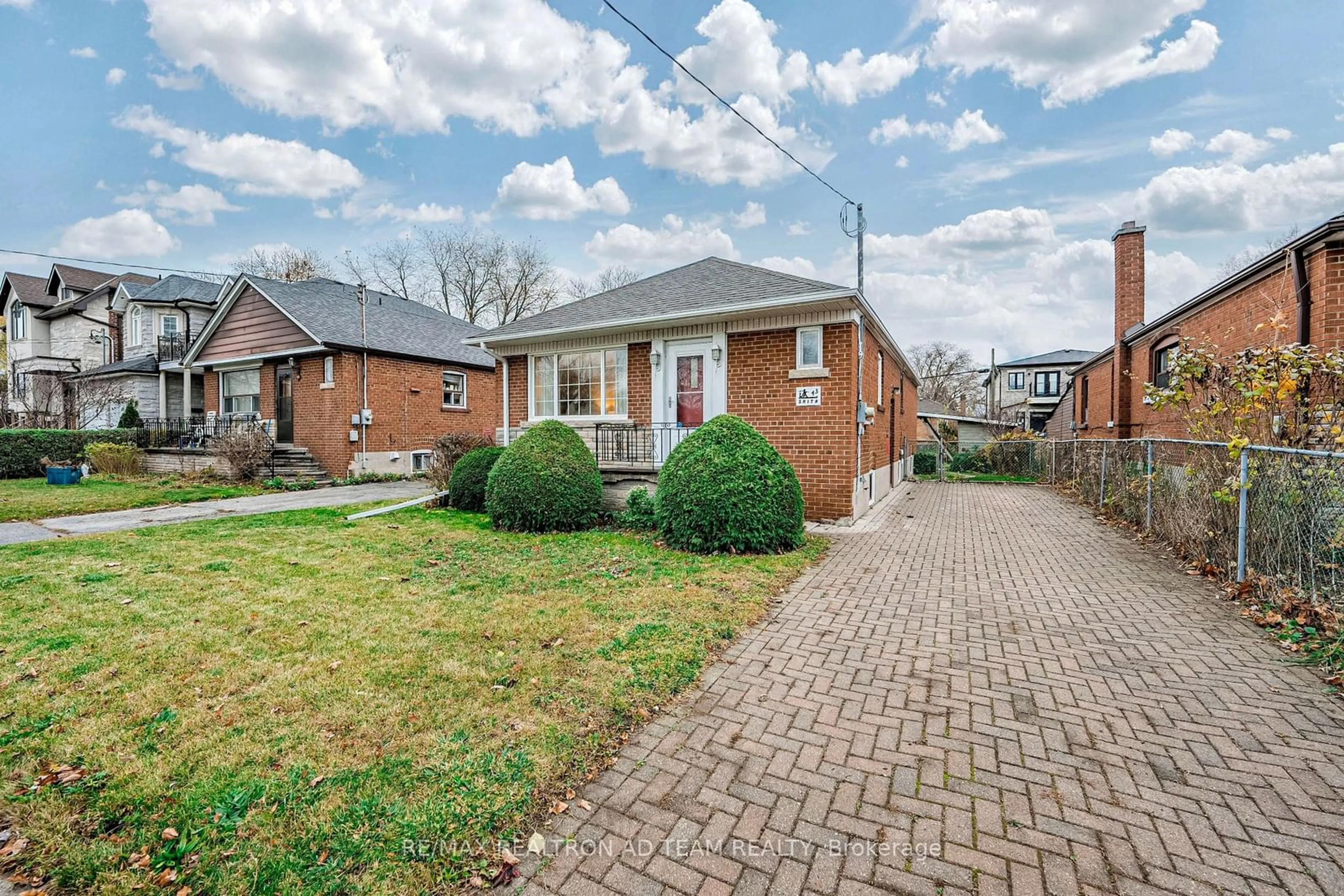 Frontside or backside of a home, the fenced backyard for 43 Flintridge Rd, Toronto Ontario M1P 1C4