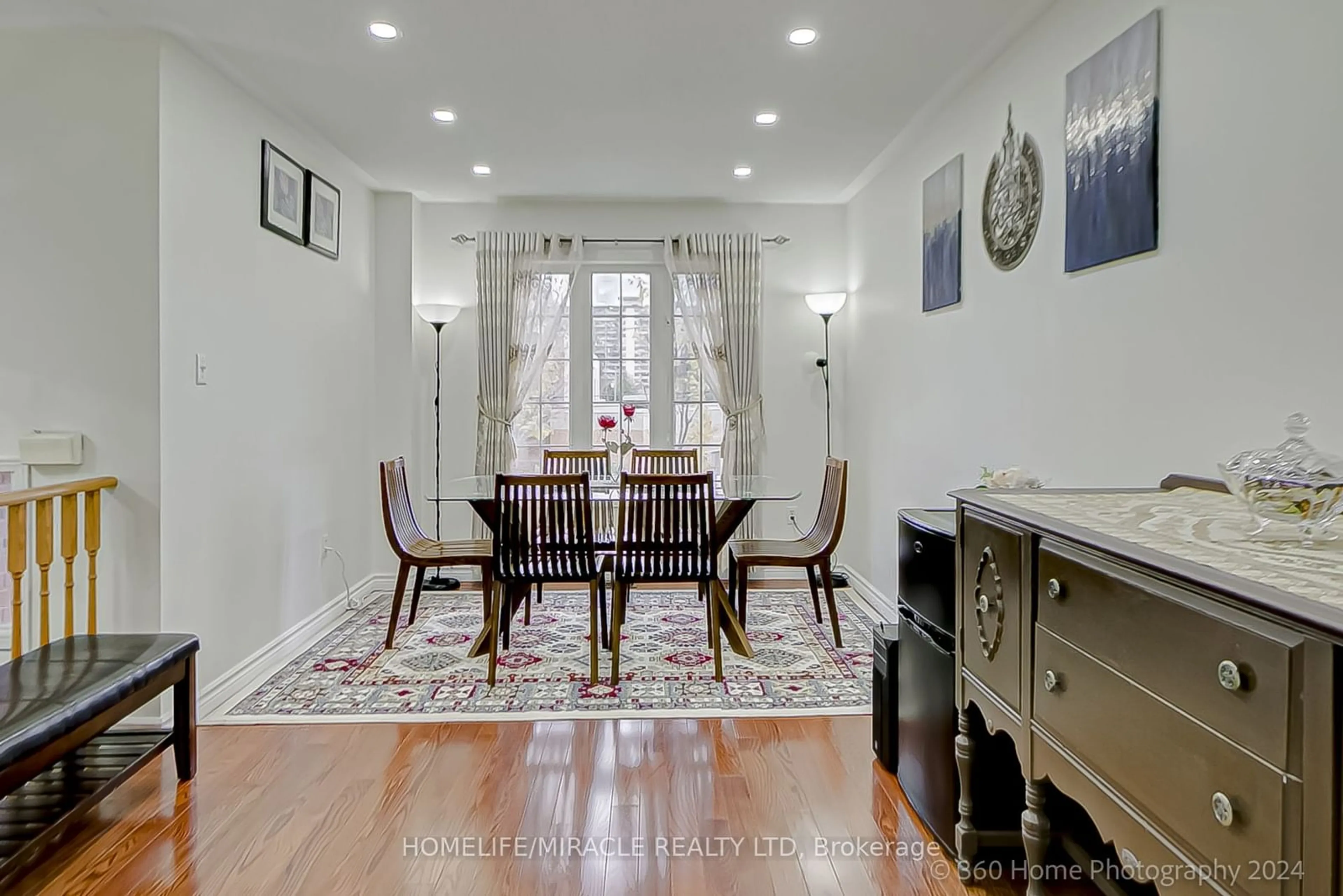 Dining room, wood floors, the street view for 24A Beachell St, Toronto Ontario M1J 3B2