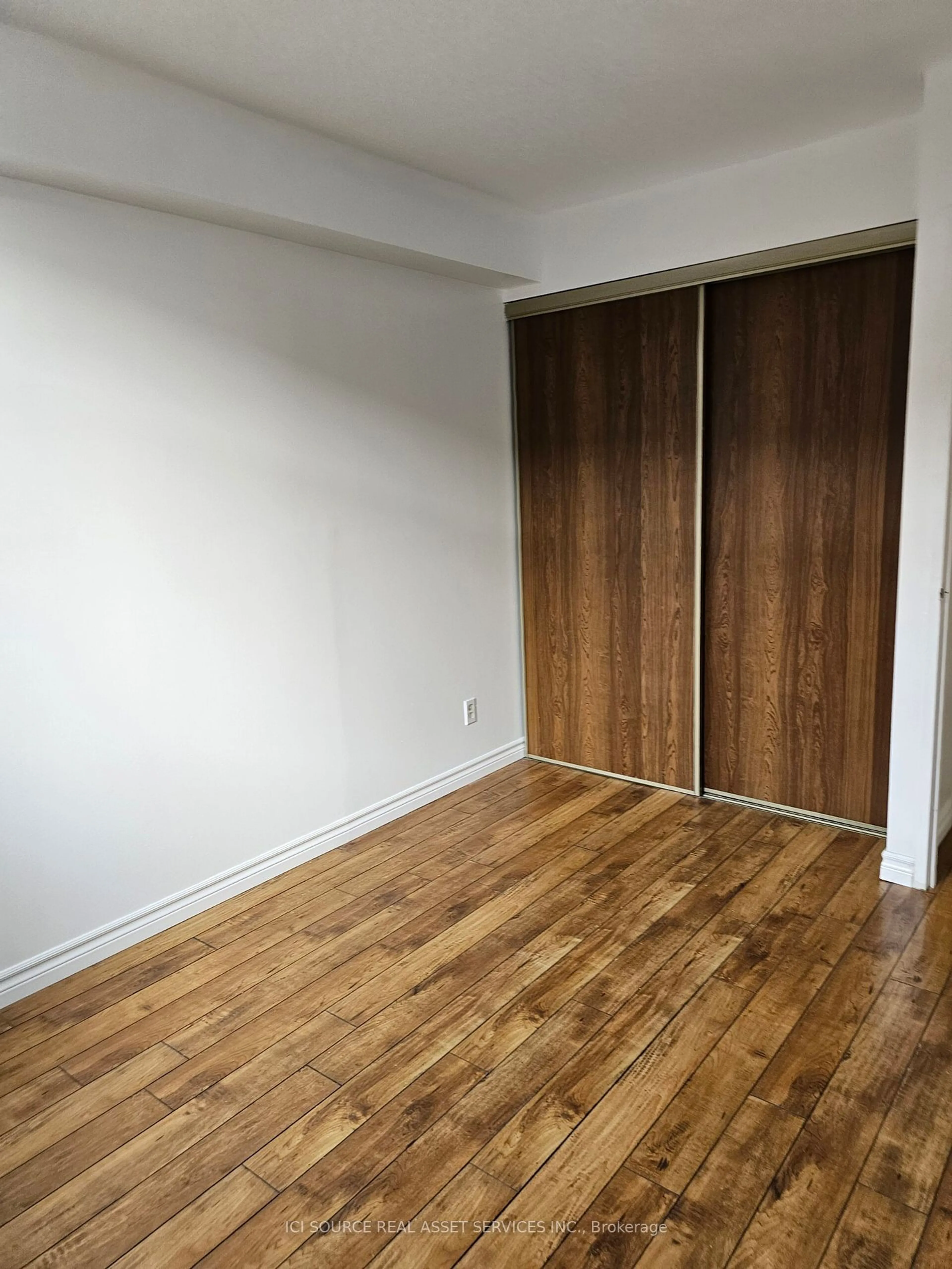 A pic of a room, wood floors for 50 Old Kingston Rd #5204, Toronto Ontario M1E 4Y1