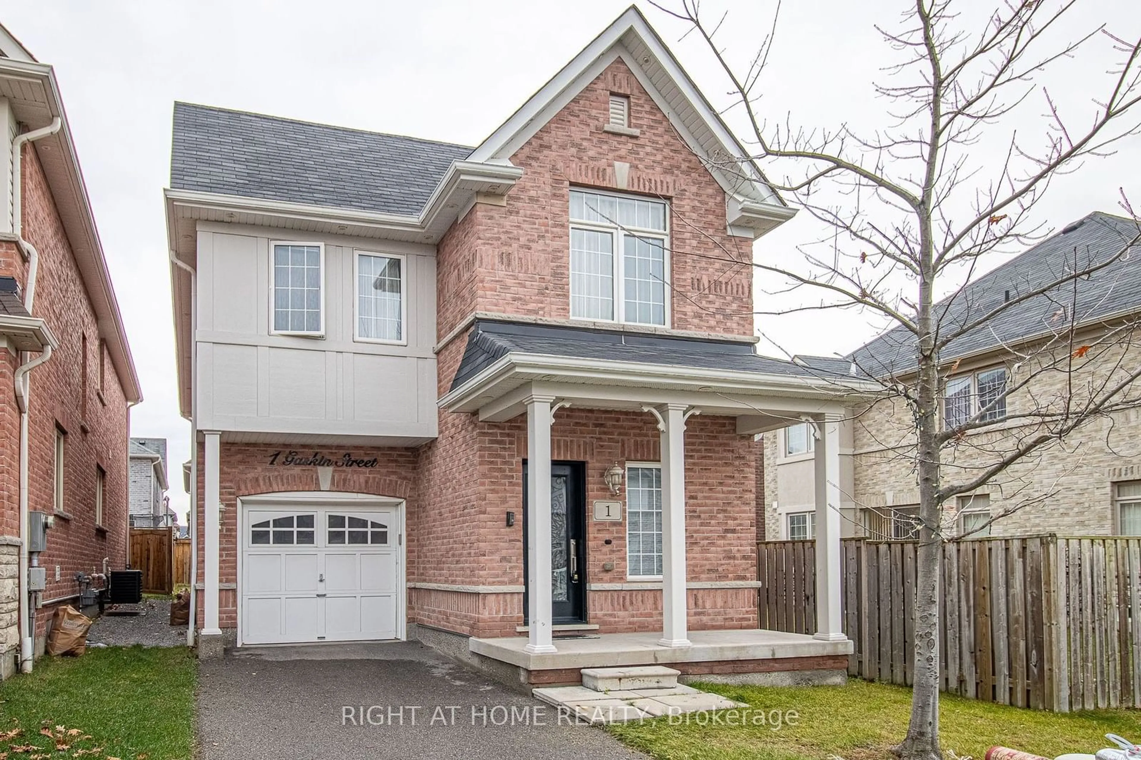 Home with brick exterior material for 1 Gaskin St, Ajax Ontario L1Z 0R5