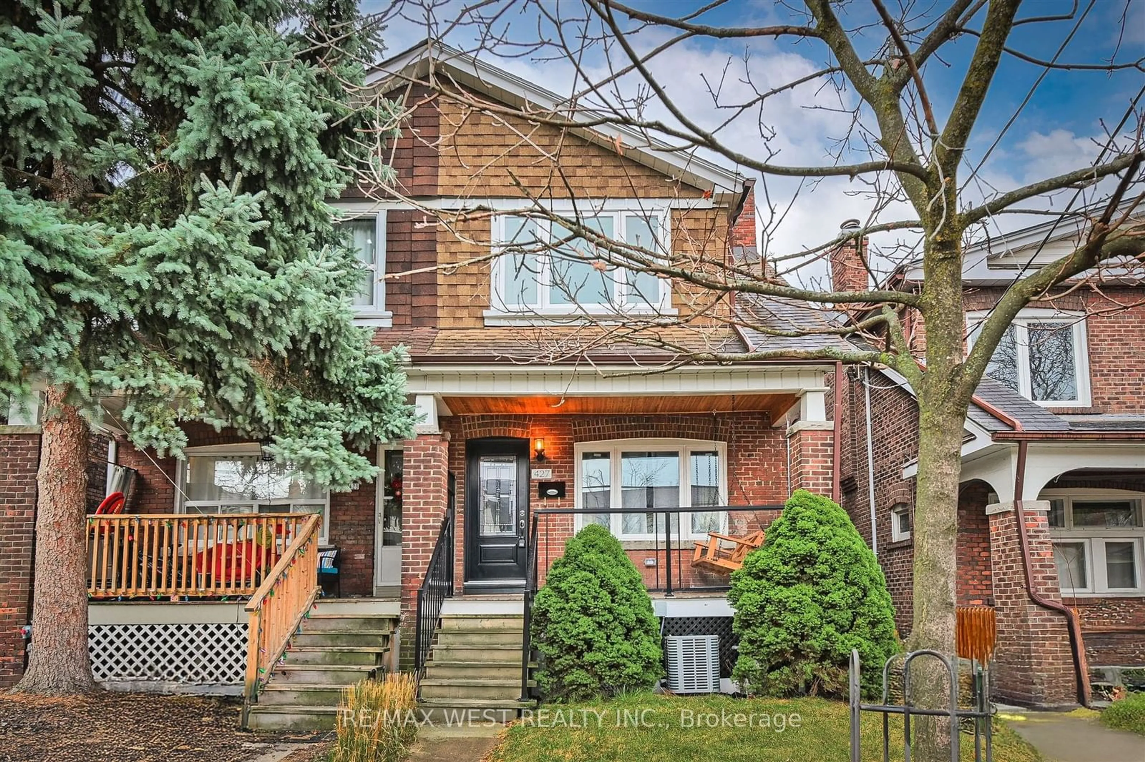 Home with brick exterior material for 427 Strathmore Blvd, Toronto Ontario M4C 1N6