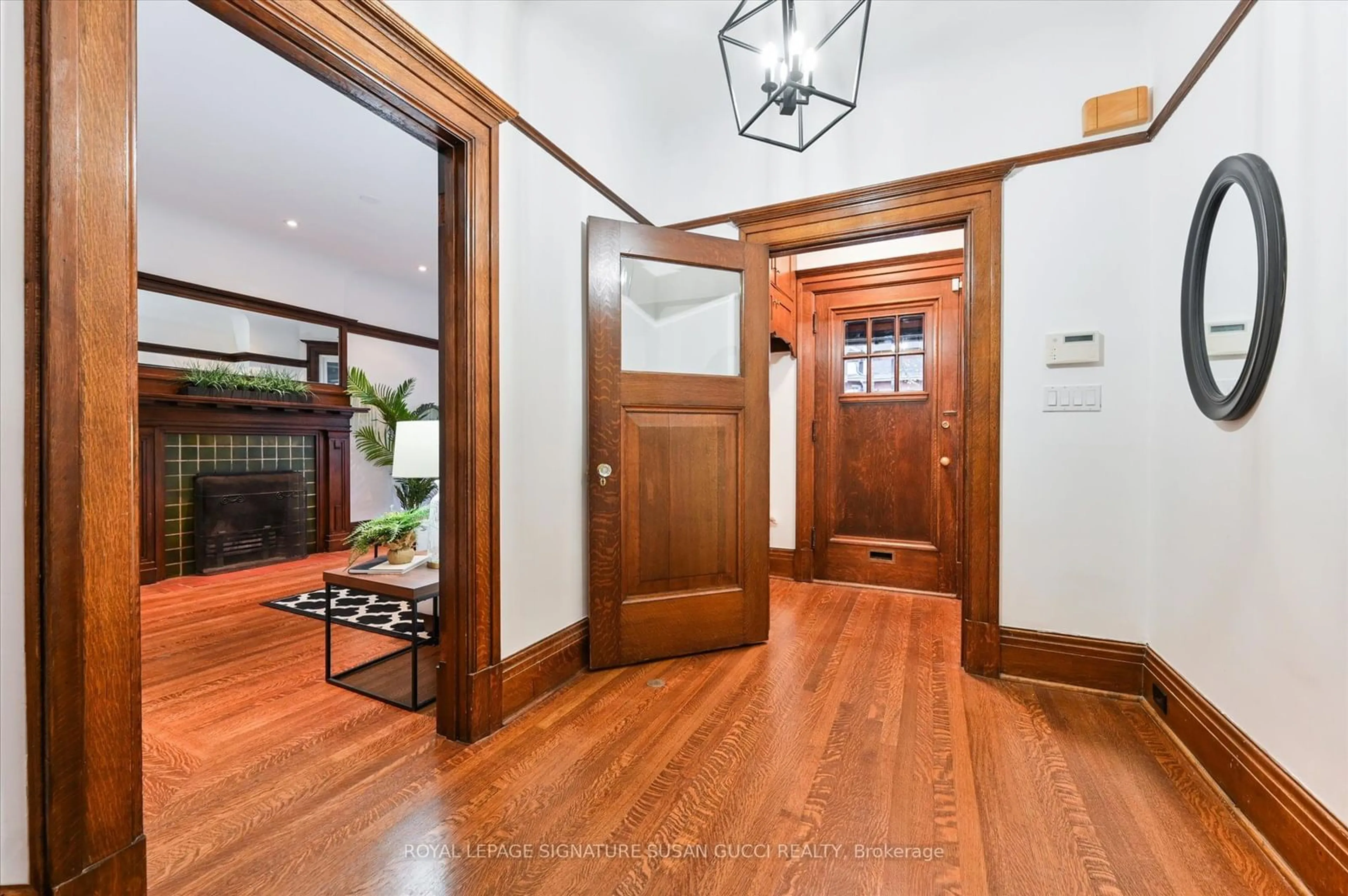 Indoor foyer, wood floors for 6 Lyall Ave, Toronto Ontario M4E 1V8