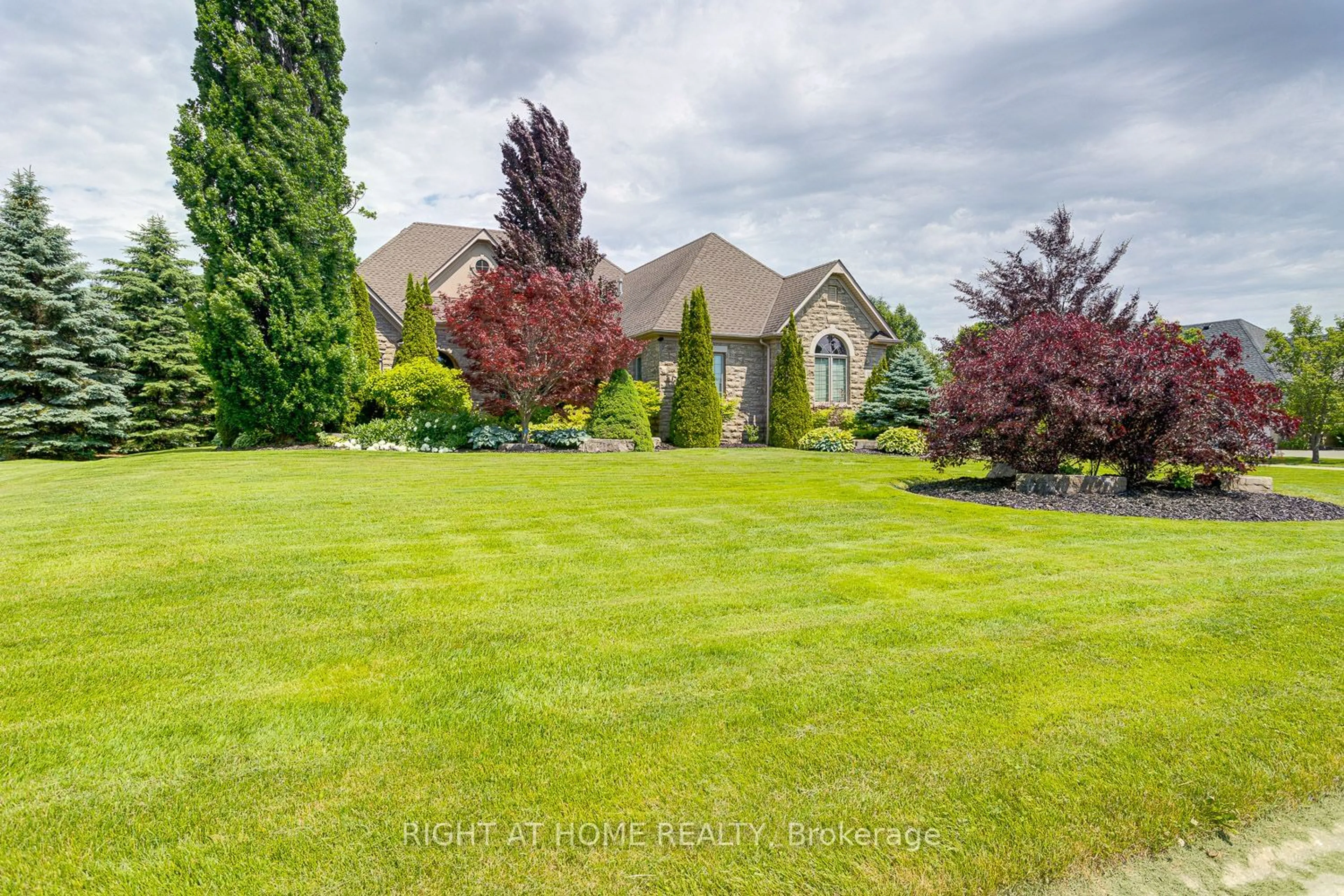 Frontside or backside of a home, the fenced backyard for 35 Wilson House Dr, Whitby Ontario L0B 1A0