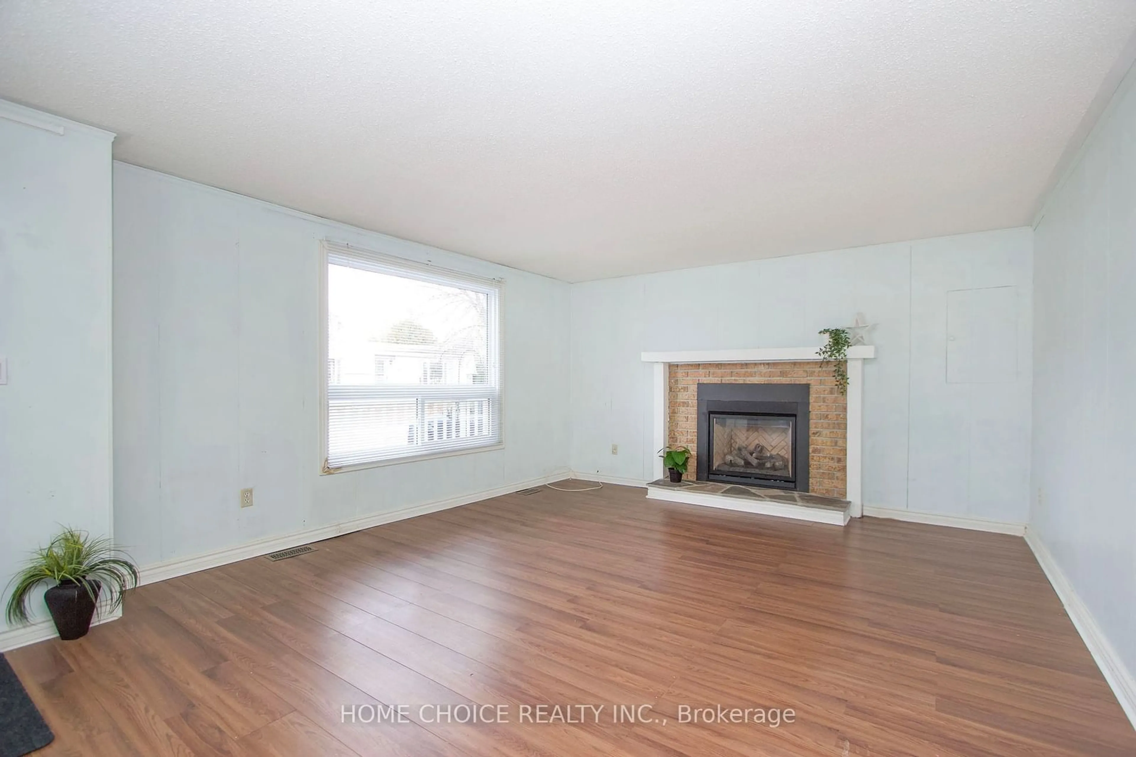 A pic of a room, wood floors for 16 The Cove Rd, Clarington Ontario L1B 1B9