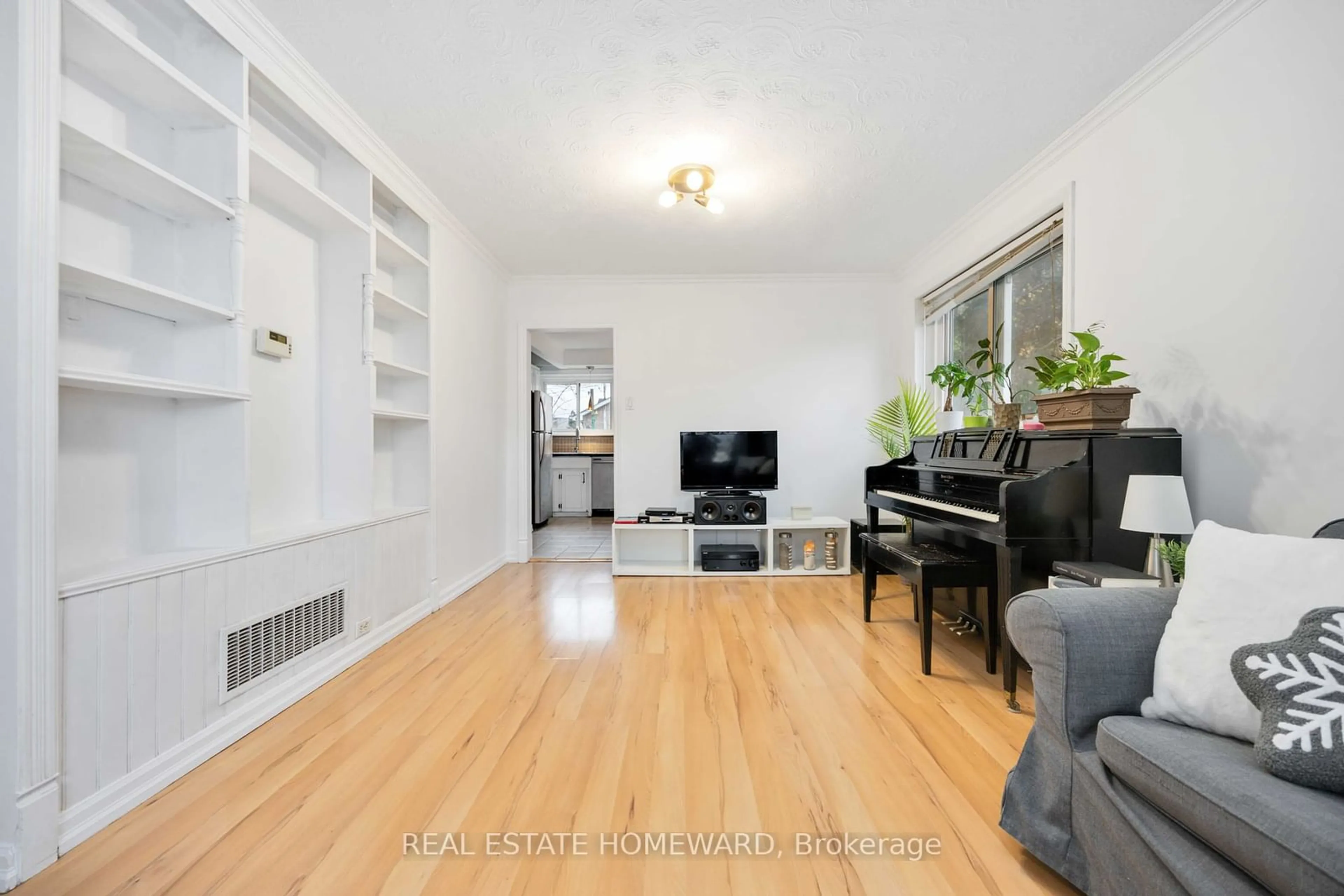 A pic of a room, wood floors for 61 Avis Cres, Toronto Ontario M4B 1B8