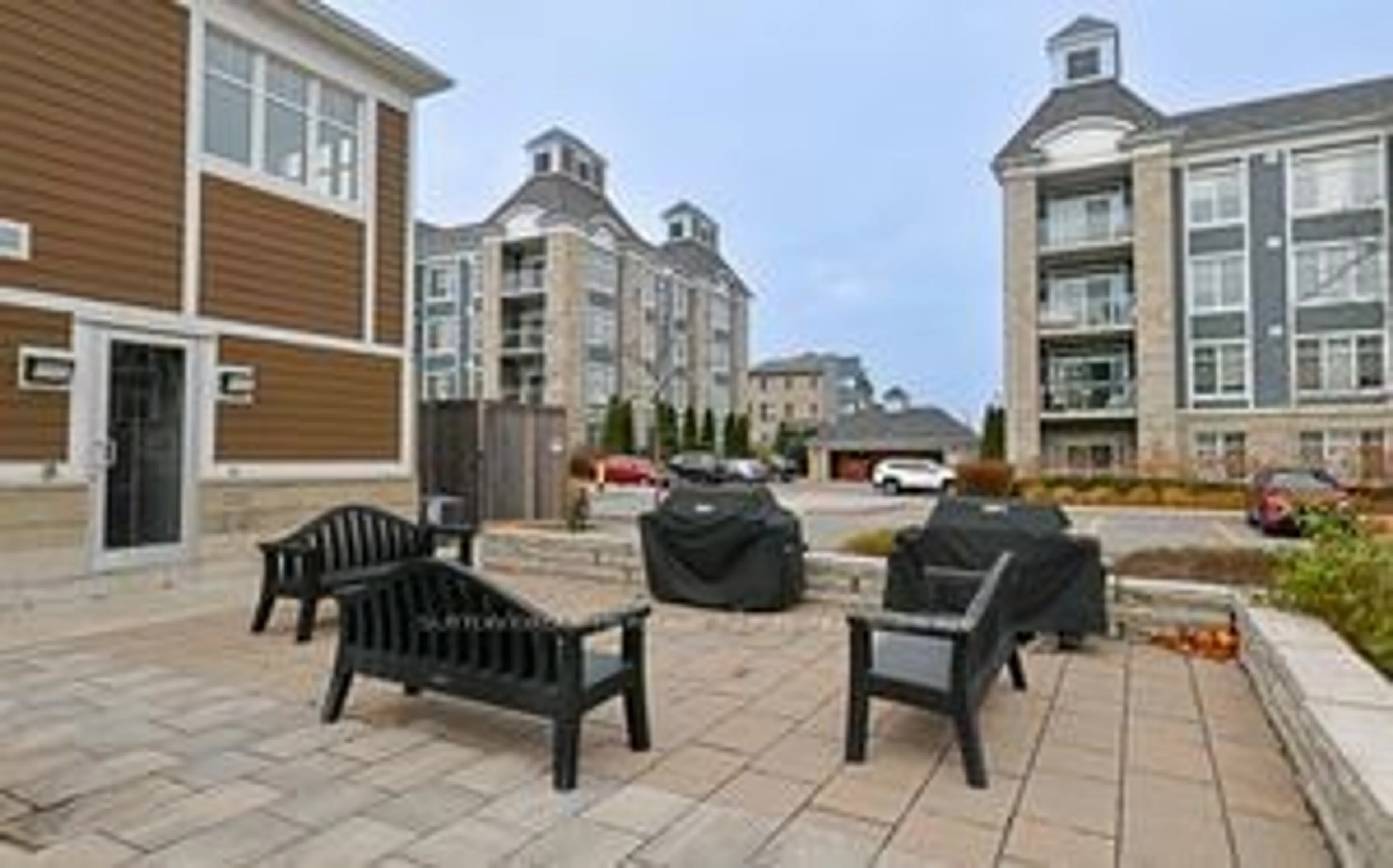 Patio, the fenced backyard for 670 Gordon St #103, Whitby Ontario L1N 5S9