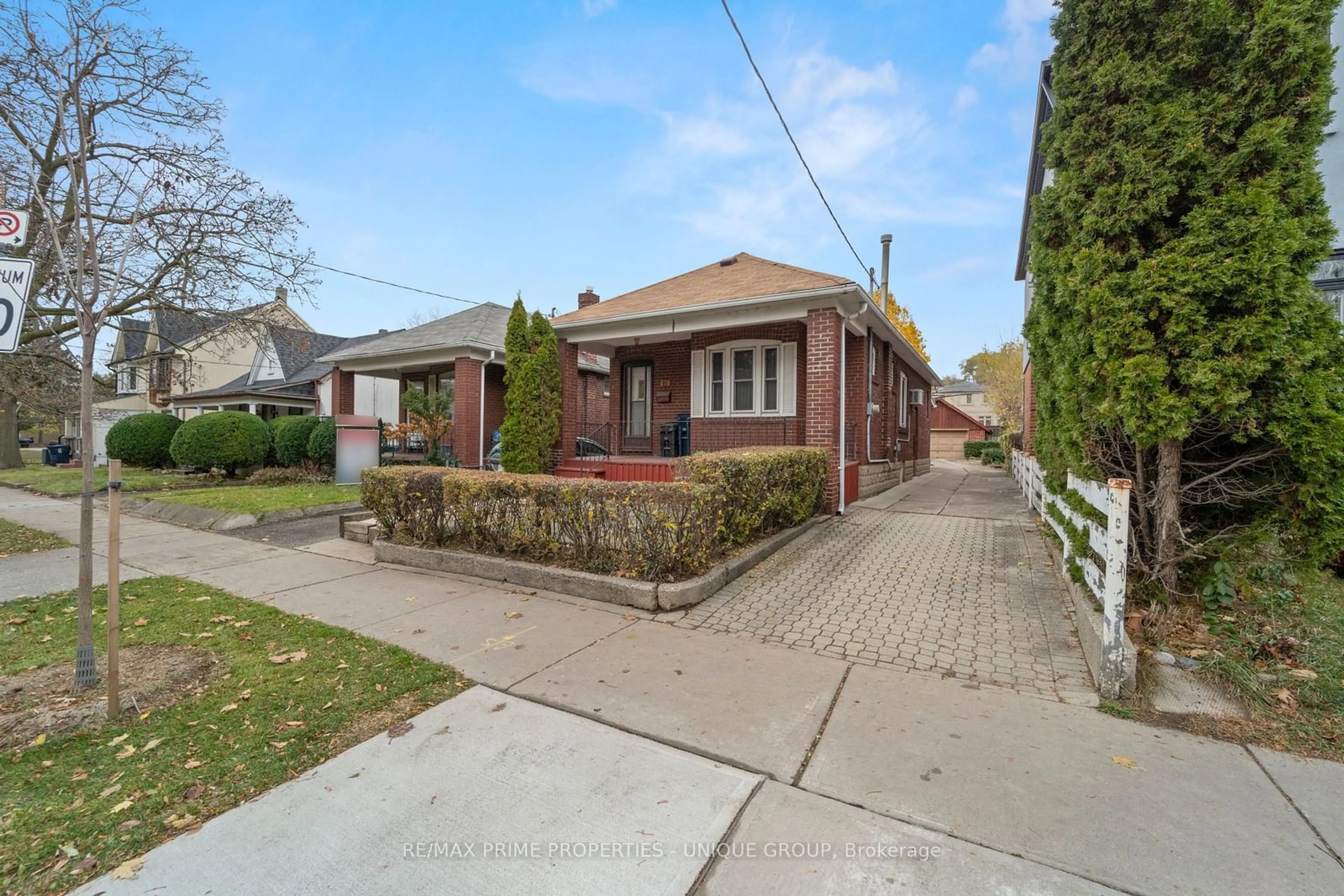 Frontside or backside of a home, the street view for 174 Gamble Ave, Toronto Ontario M4J 2P3