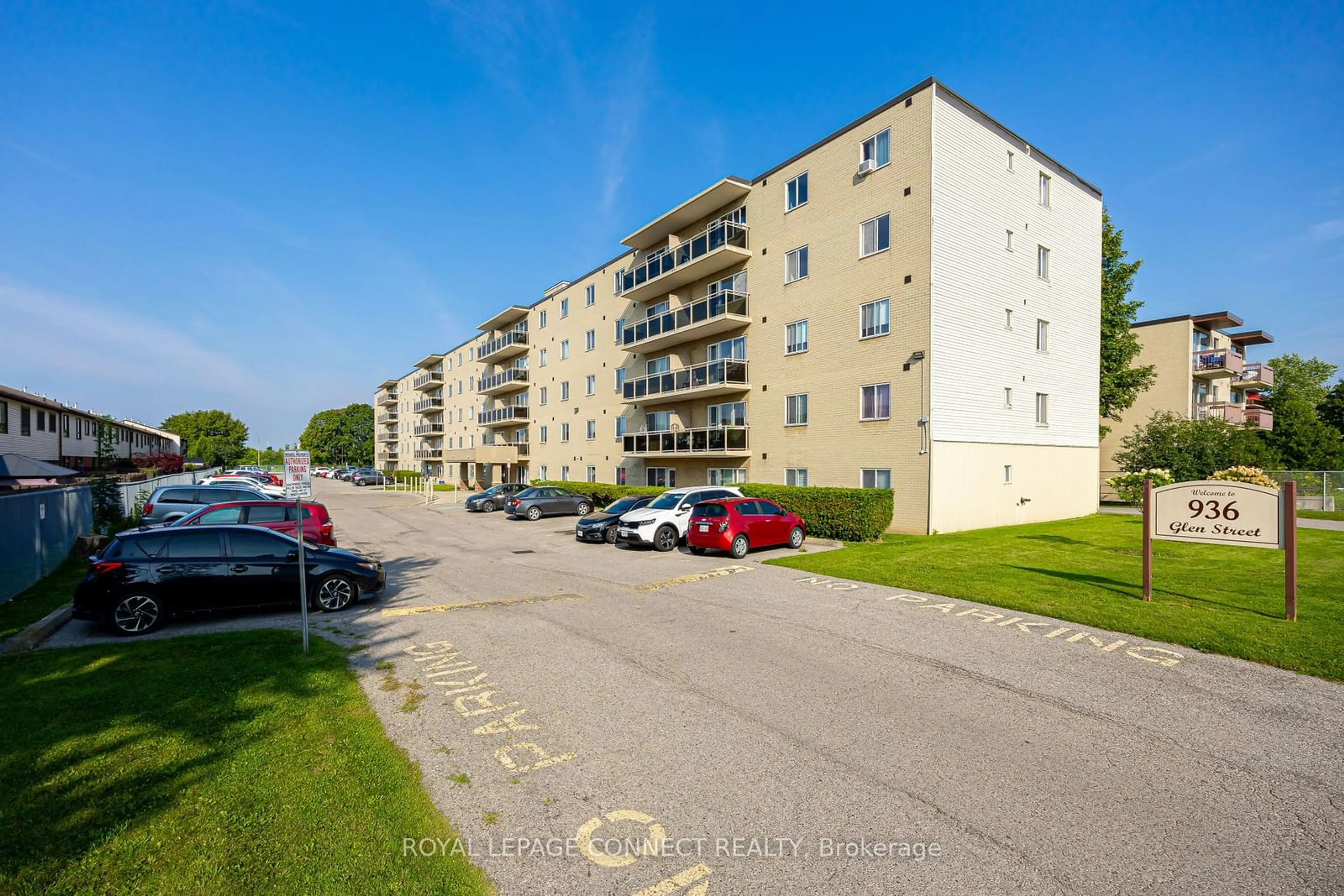 A pic from exterior of the house or condo, the street view for 936 Glen St #211, Oshawa Ontario L1J 5Z7