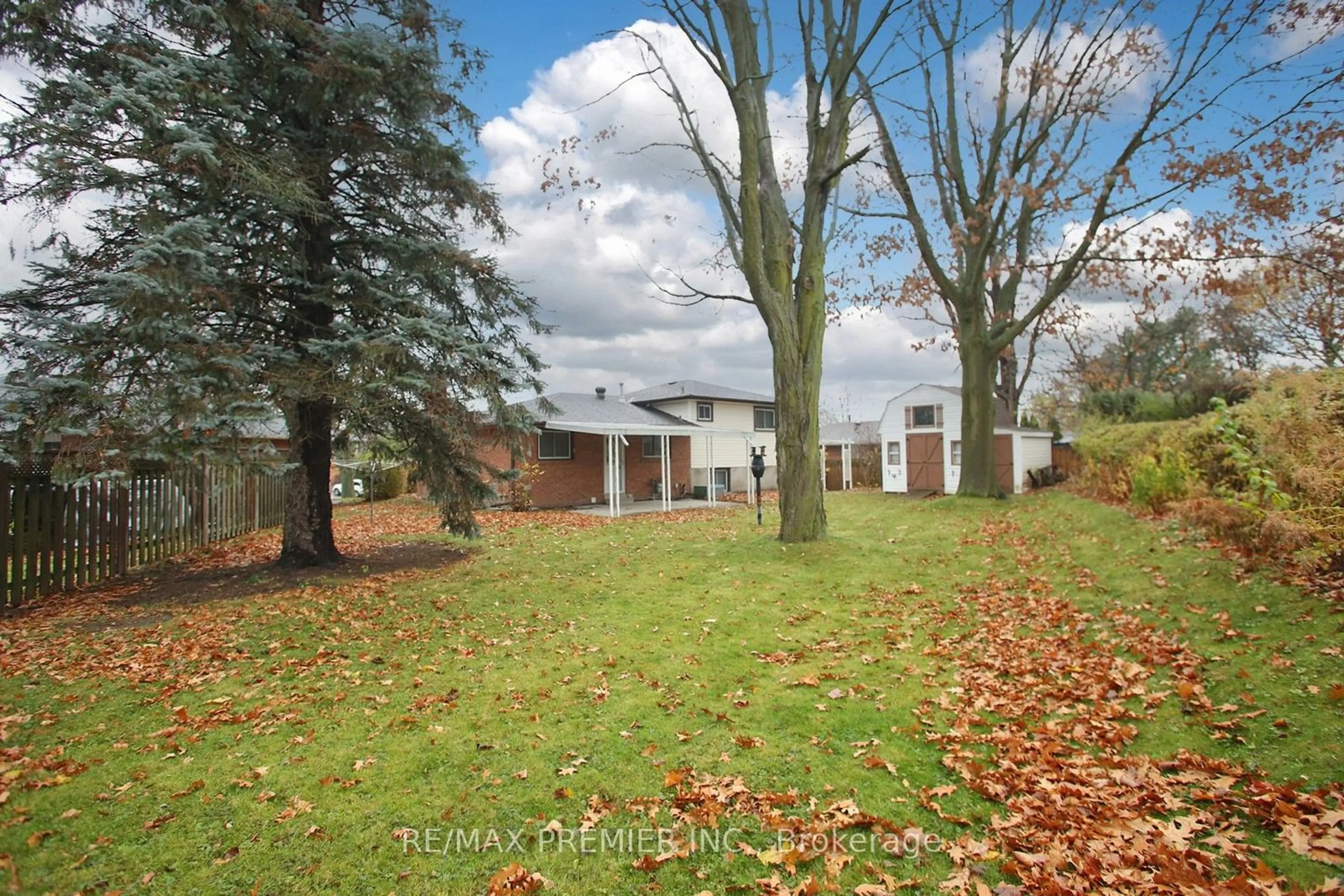 A pic from exterior of the house or condo, the fenced backyard for 388 Marken Crt, Oshawa Ontario L1G 2K1