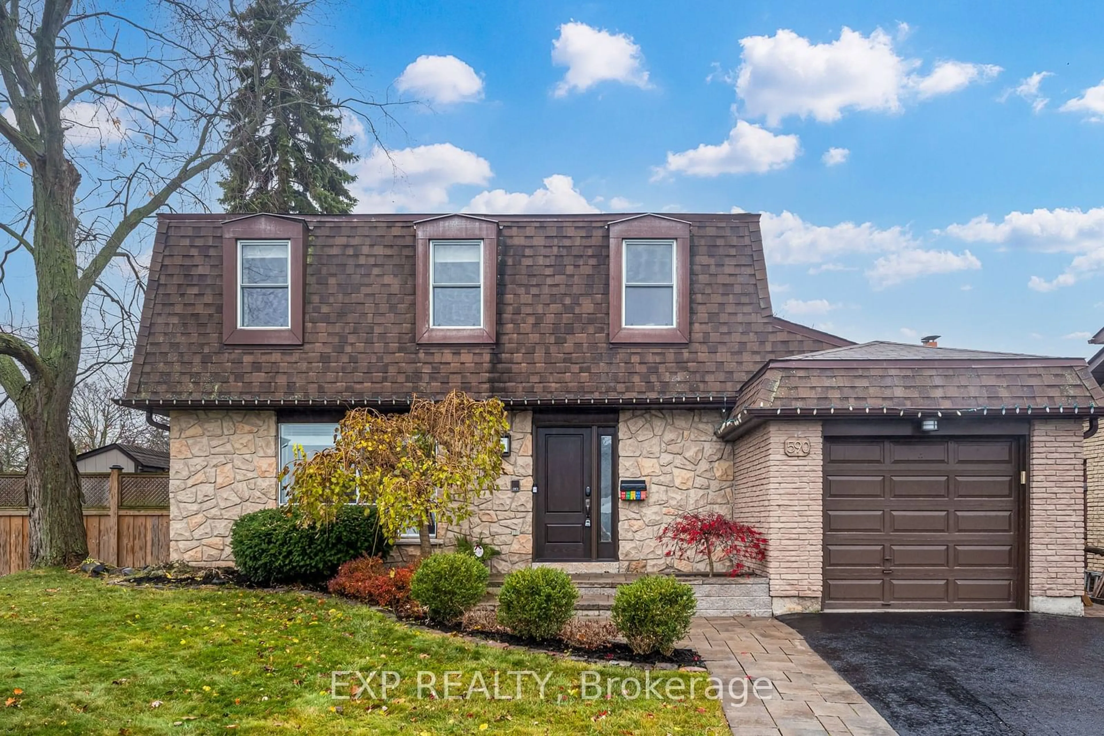 Home with brick exterior material for 590 Stonebridge Lane, Pickering Ontario L1W 3B3