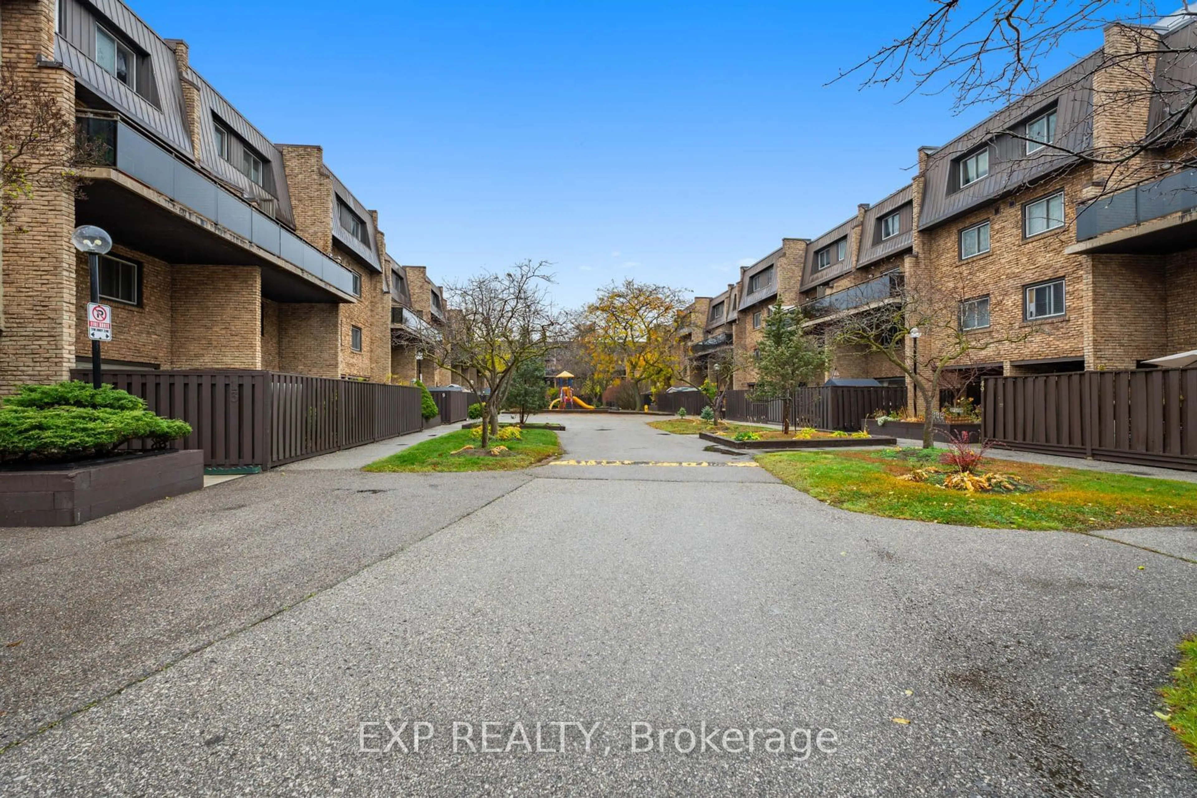 A pic from exterior of the house or condo, the fenced backyard for 120 Ling Rd #35, Toronto Ontario M1E 4V9