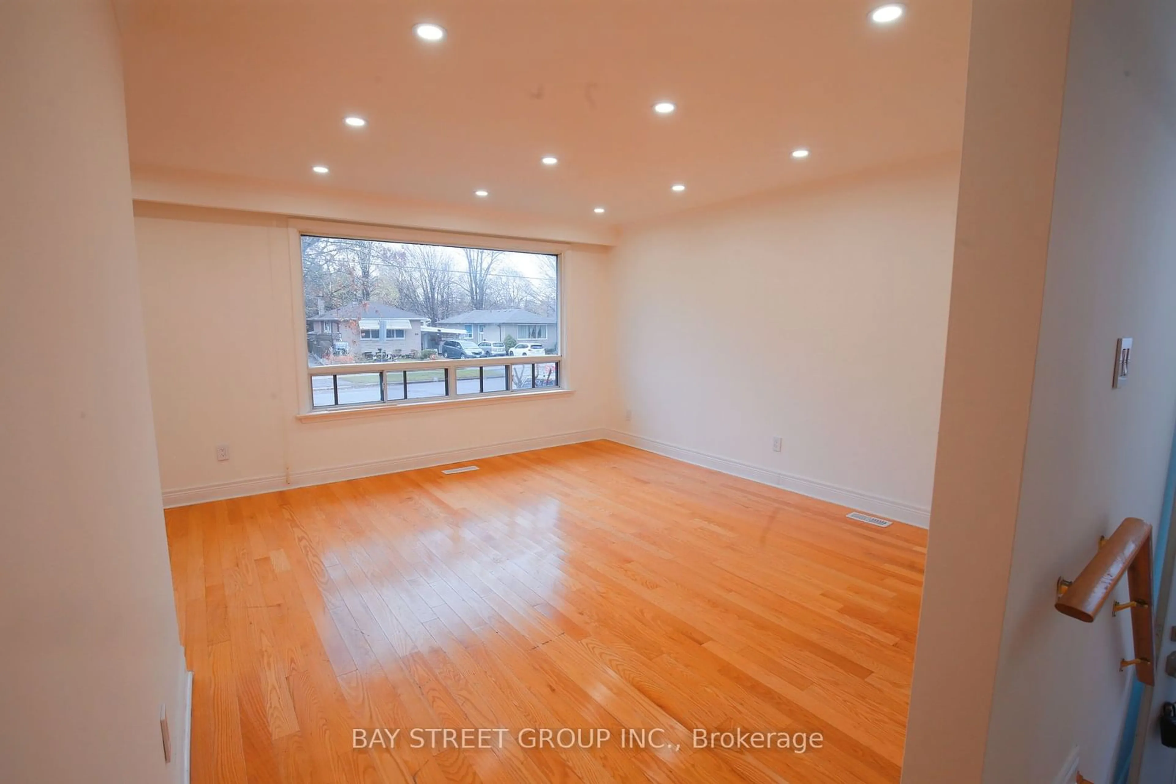 A pic of a room, wood floors for 27 Manorwood Rd, Toronto Ontario M1P 4G8