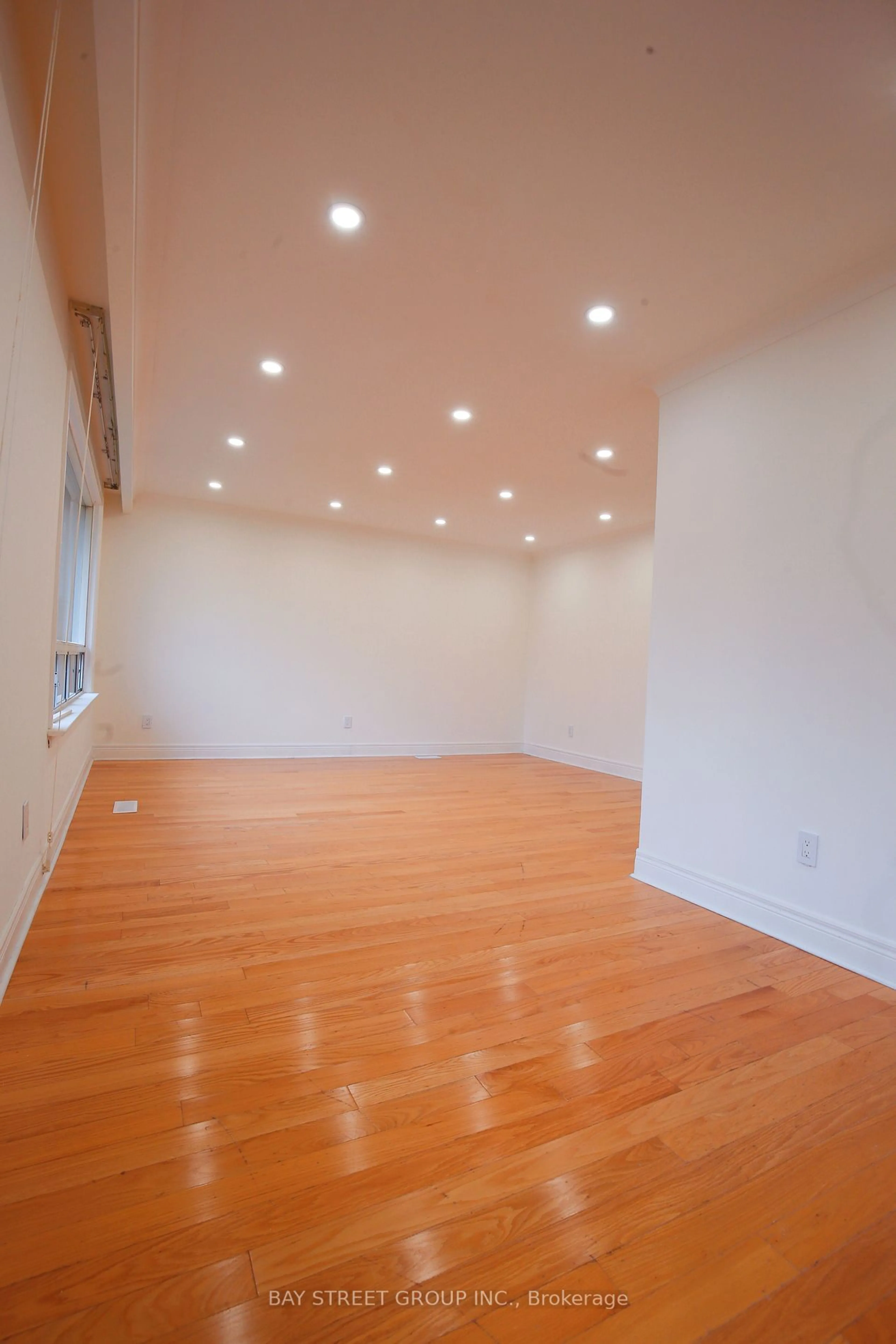 A pic of a room, wood floors for 27 Manorwood Rd, Toronto Ontario M1P 4G8