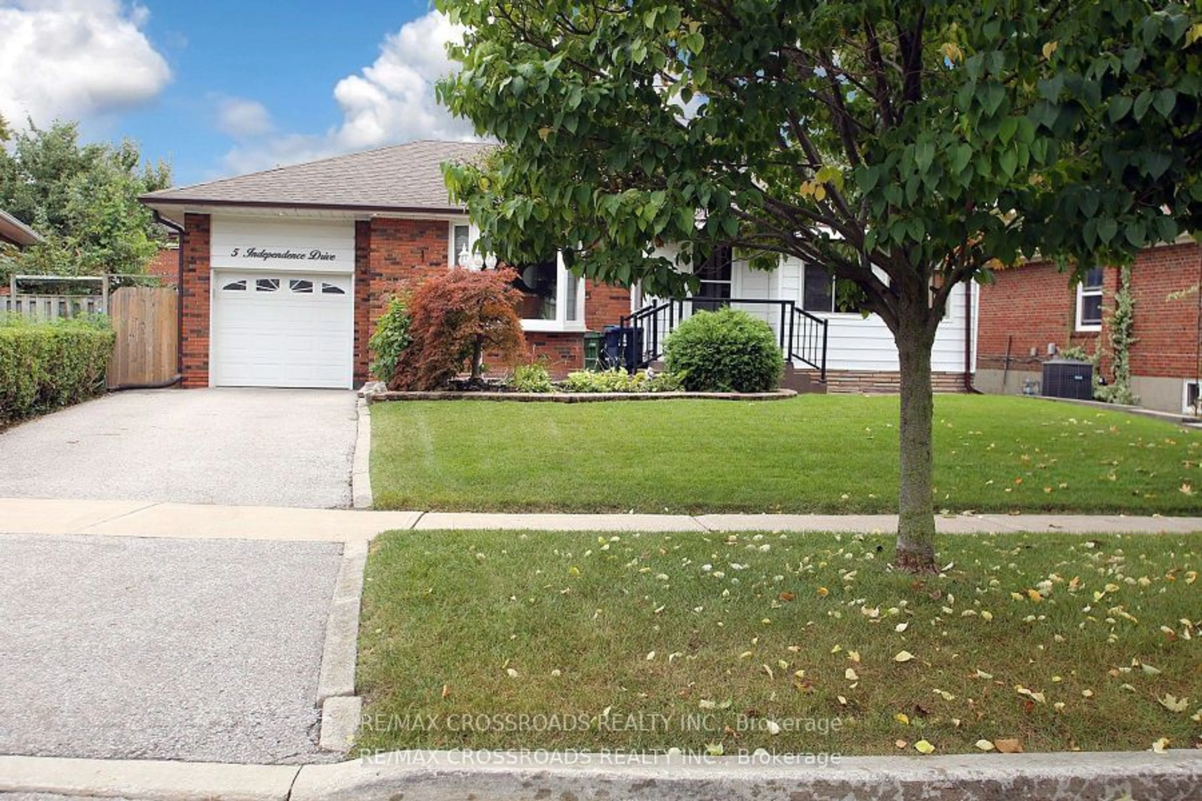 Frontside or backside of a home, the street view for 5 Independence Dr, Toronto Ontario M1K 3R7