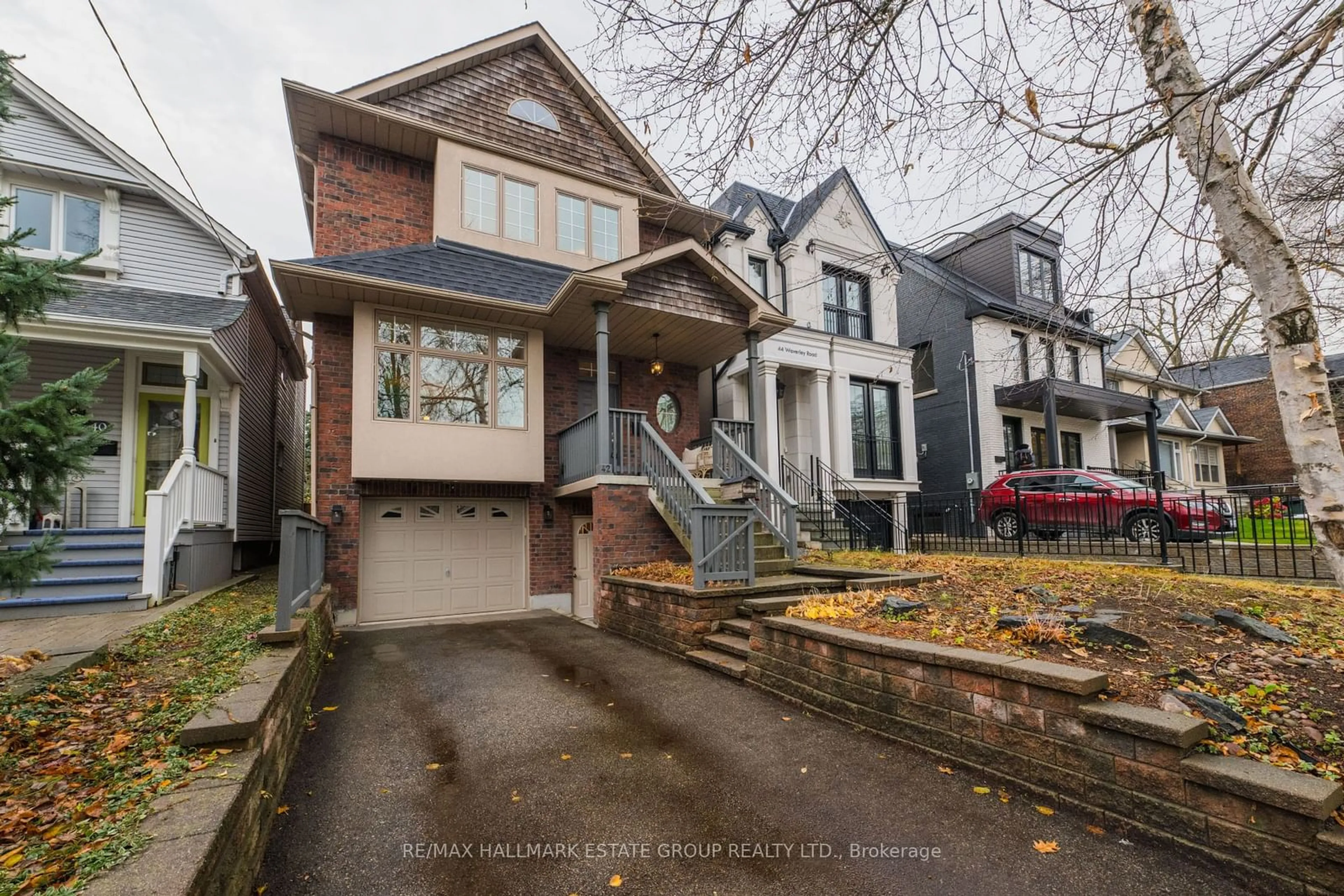 Frontside or backside of a home, the street view for 42 Waverley Rd, Toronto Ontario M4L 3T1