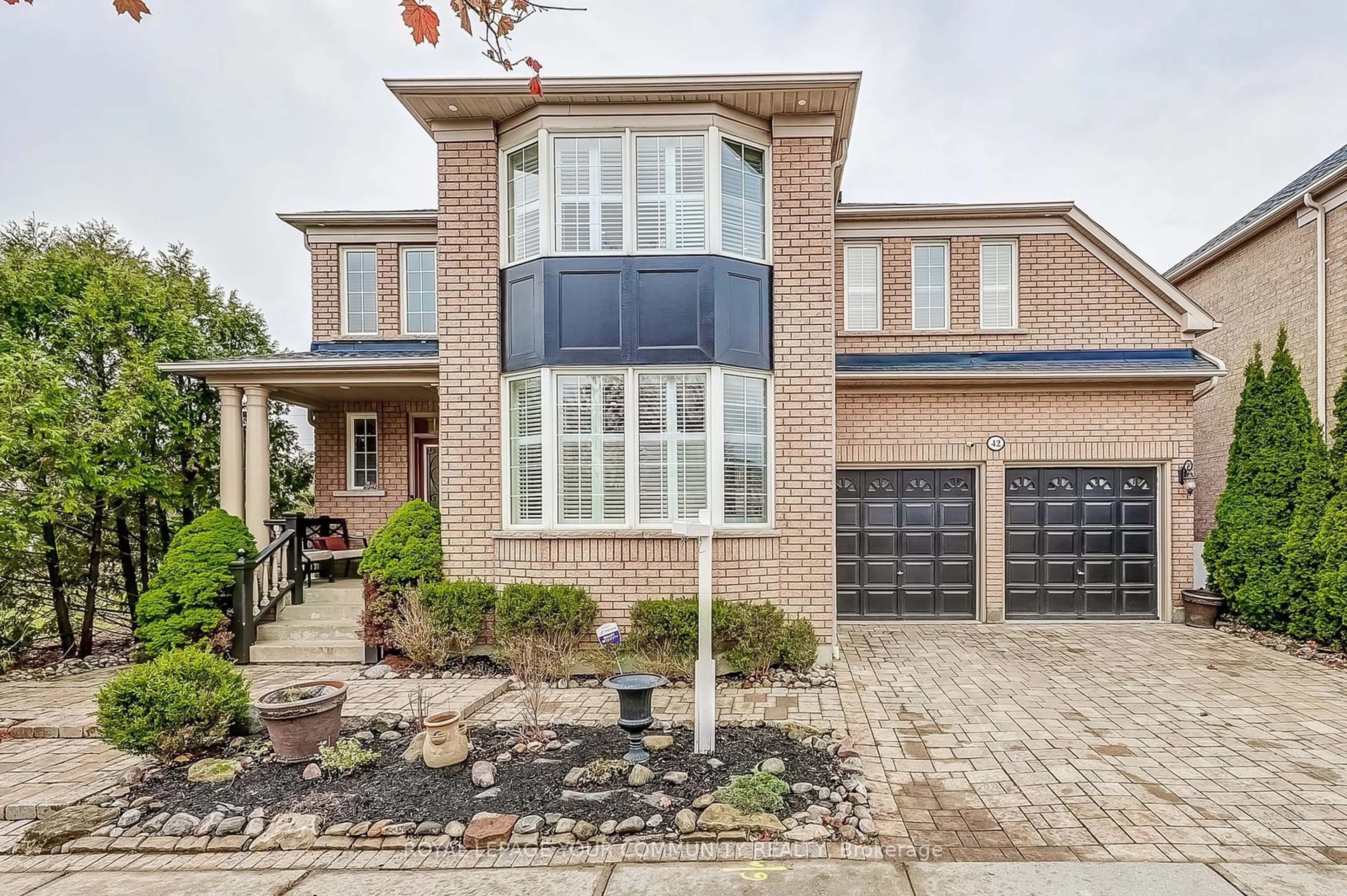 Home with brick exterior material for 42 O'Shea Cres, Ajax Ontario L1T 4W7