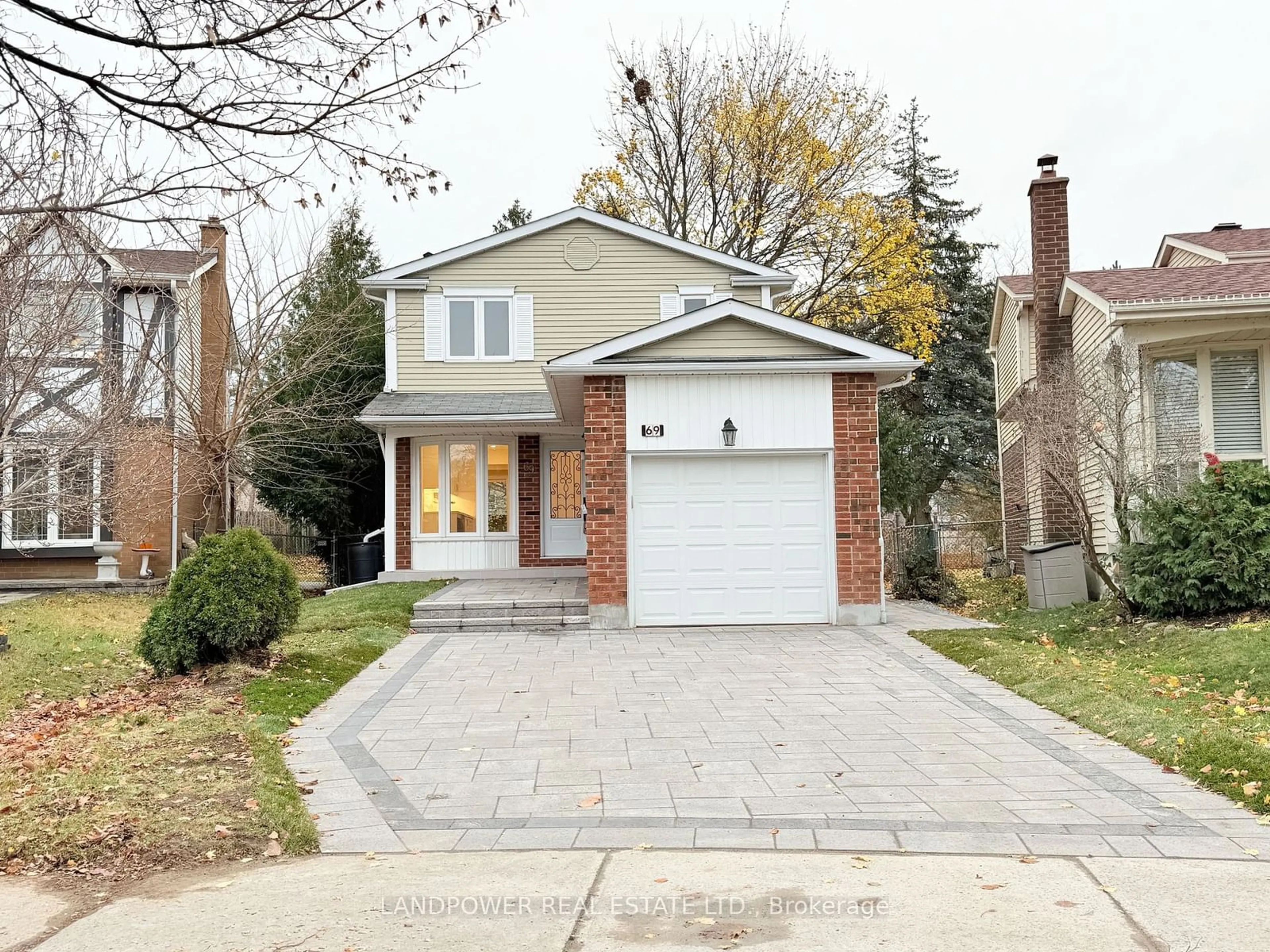 Home with brick exterior material for 69 Moorehouse Dr, Toronto Ontario M1V 2E2