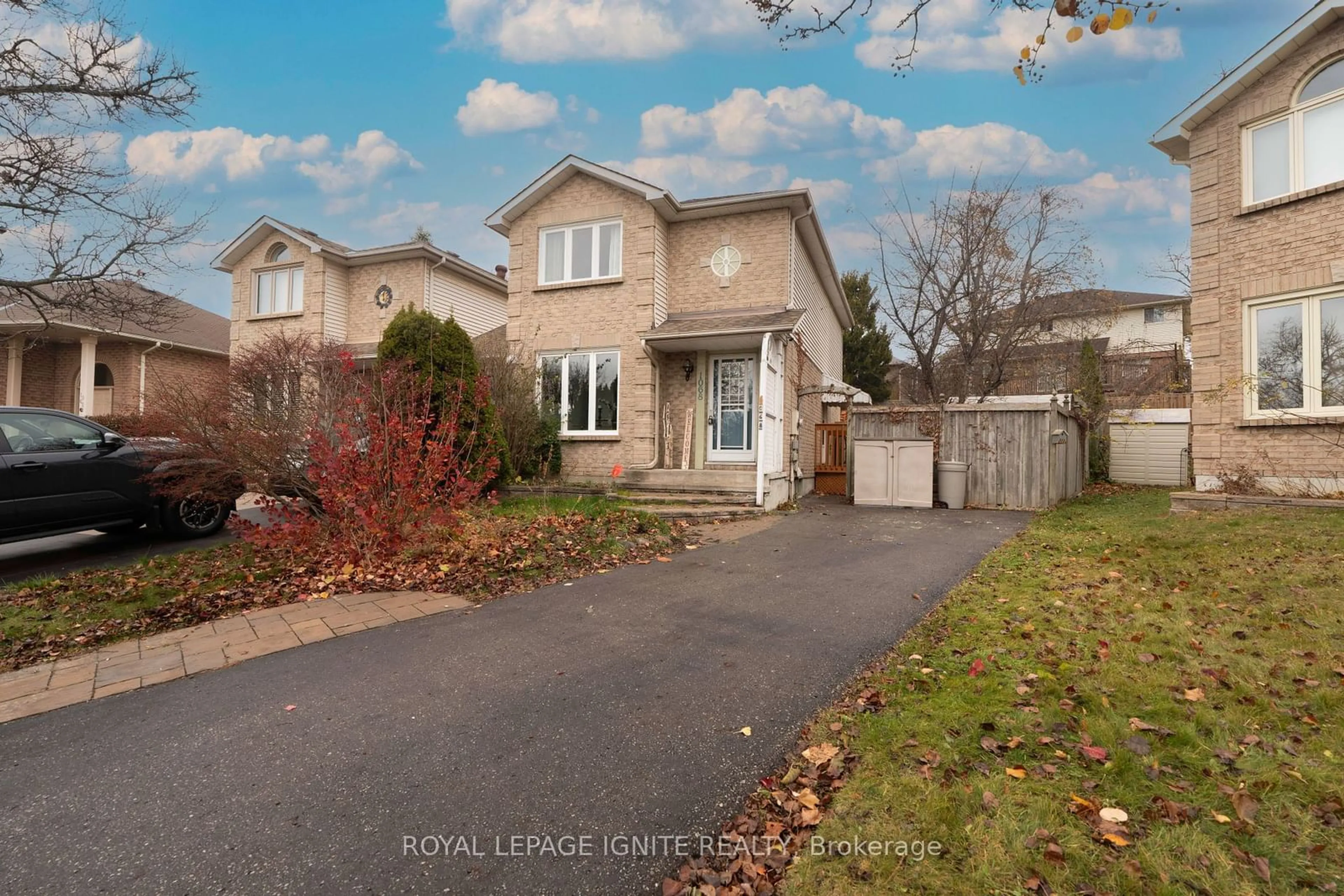 Frontside or backside of a home, the fenced backyard for 1068 Pepperbush Crt, Oshawa Ontario L1K 2J4