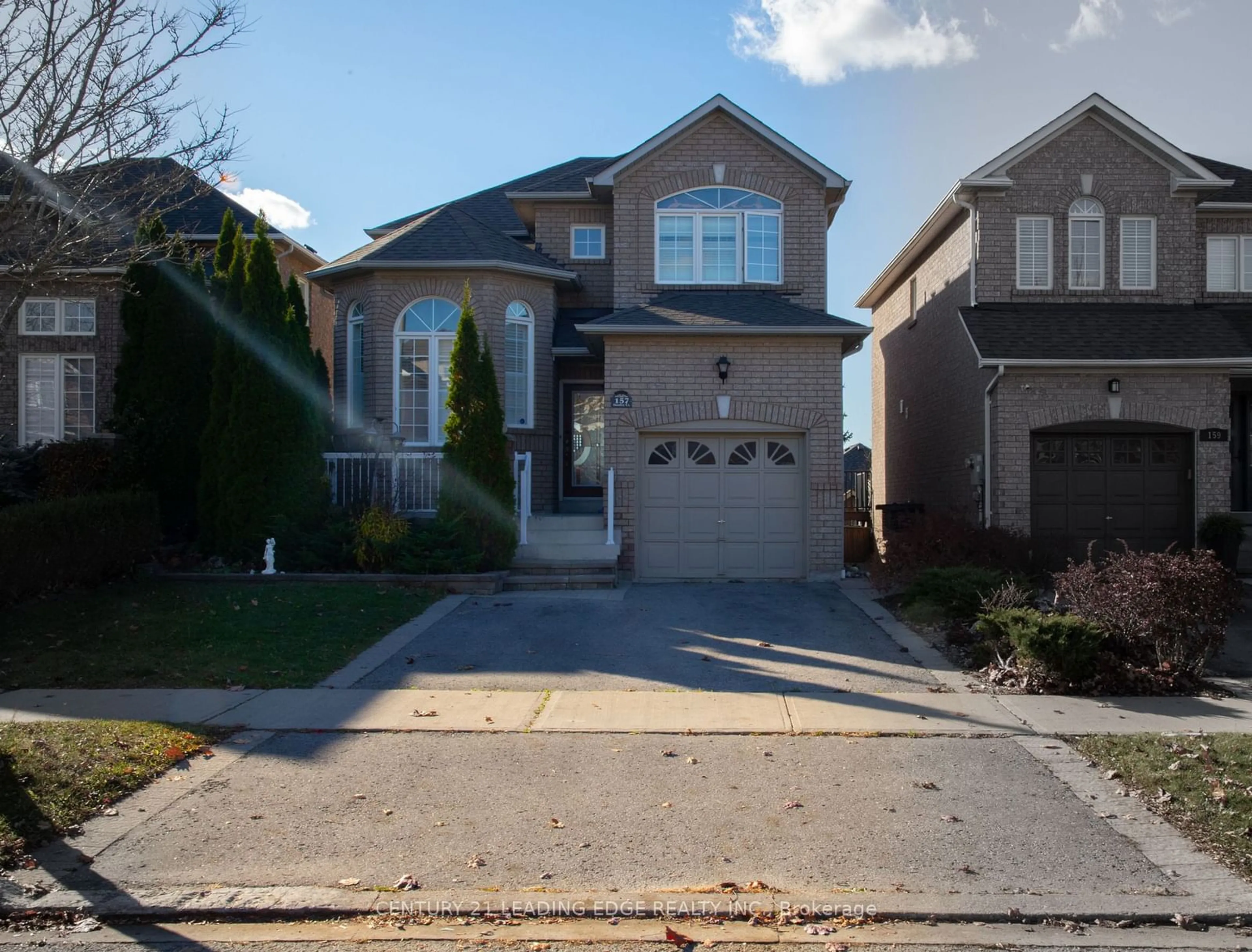 Frontside or backside of a home, the street view for 157 Dooley Cres, Ajax Ontario L1T 4J6